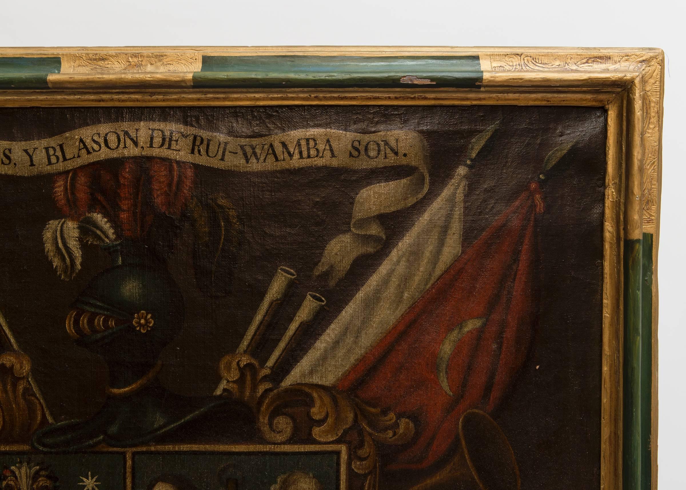 19th century oil painting of coat of arms in a green and gilt custom frame.