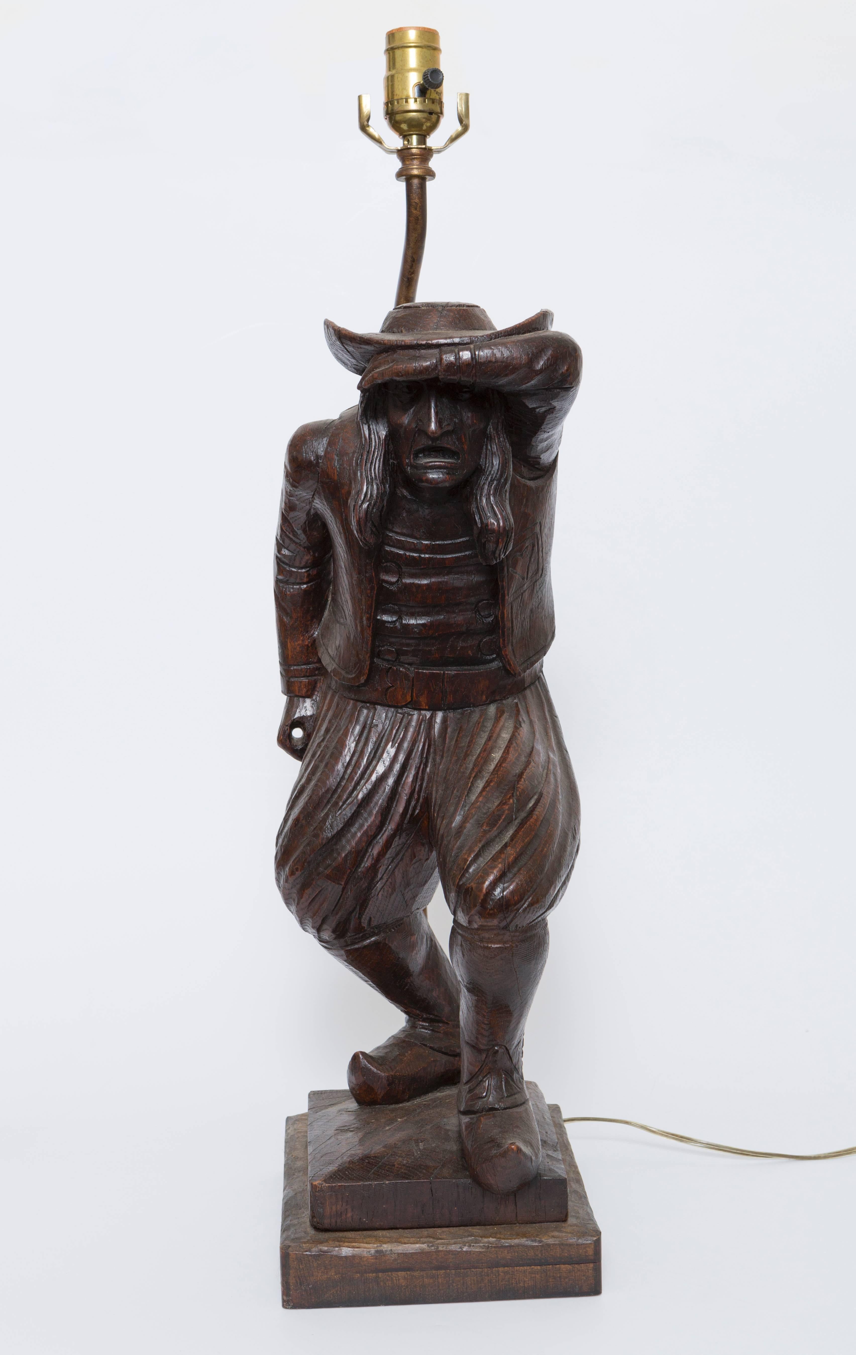 19th Century Wood Carved Lamp of a Brittany Man. This interesting wood carved lamp of man on the 