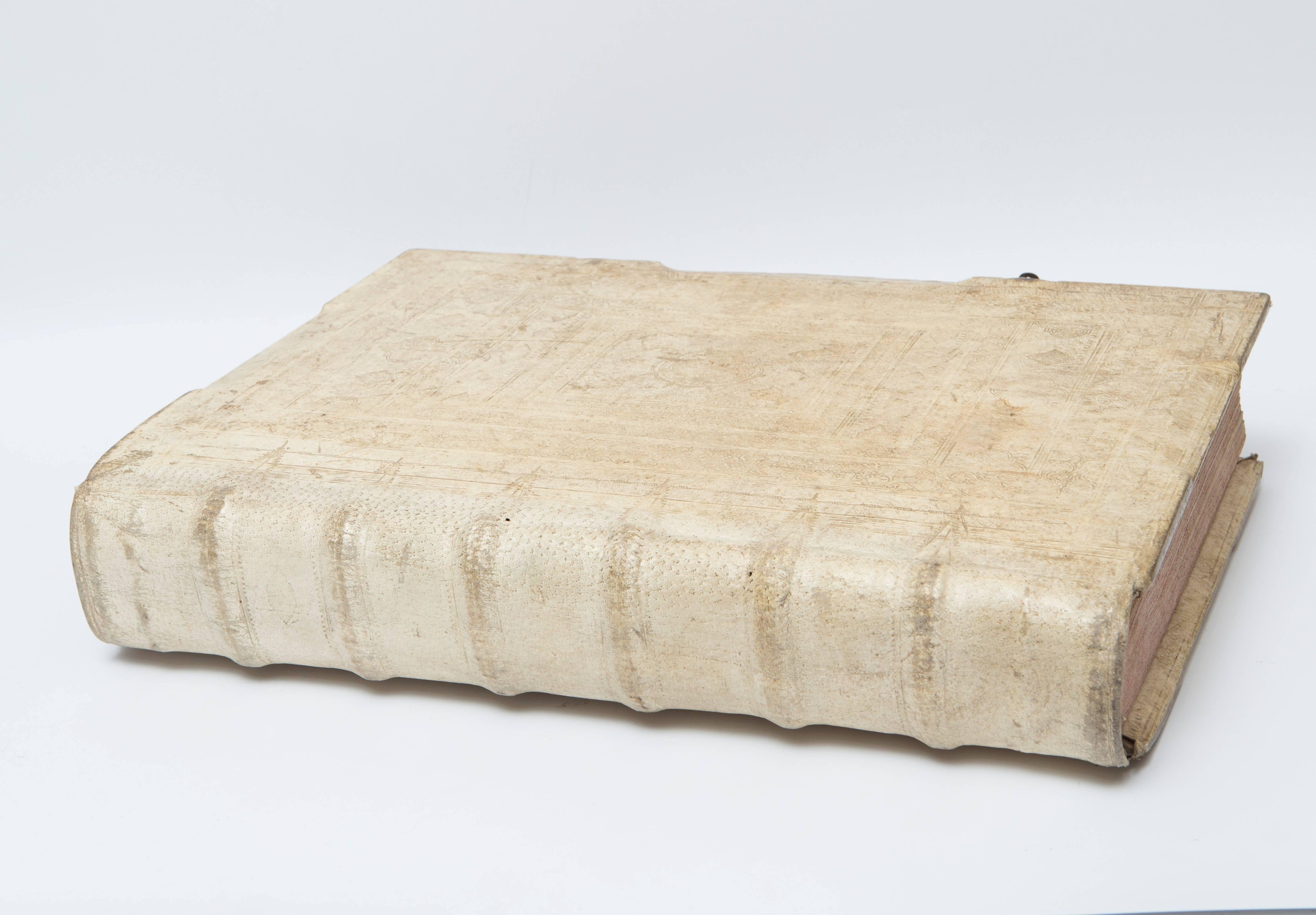 Large all Vellum Music Score, Circa 1680,  book with iron latches in a very impressive size and detail. Inside the 17th Century vellum book are pages printed with red and black notes and words and music score. Very impressive piece of art in an all