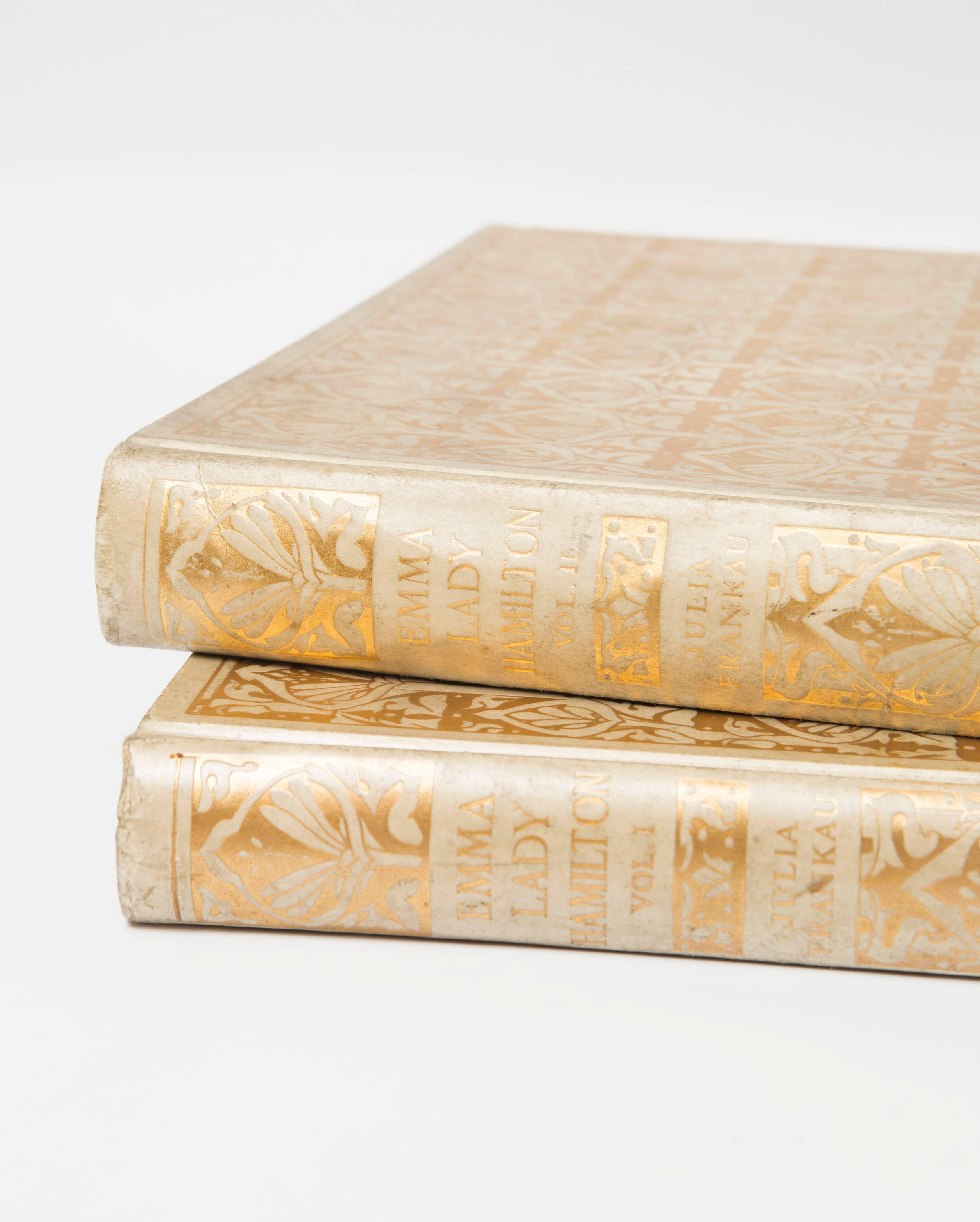 This set of two vellum volumes of the story of Emma, Lady Hamilton by Julia Frankau is from Macmillan and Co., Limited on Saint Martin's Street, London, 1911. The set is in vellum with gold embossing. The set is large and very impressive. 
