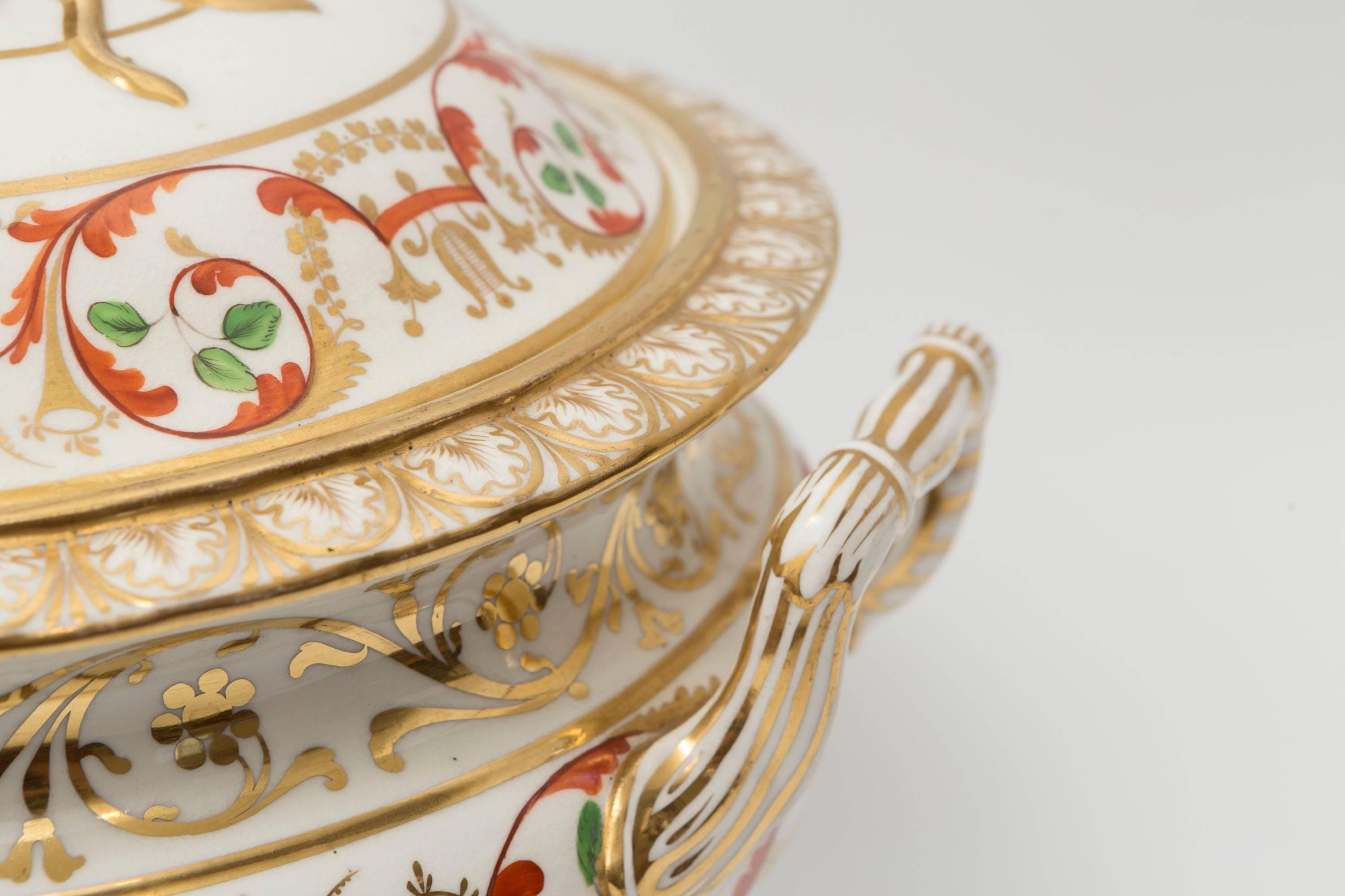 Antique English derby soup tureen. In shades of orange, green and gold