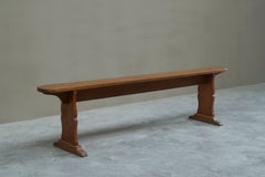 Panca scultorea in stile provinciale europeo, in legno massello, 1900