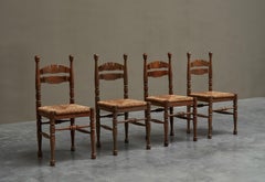 Lot de 4 chaises originales en chêne massif et jonc, années 1950