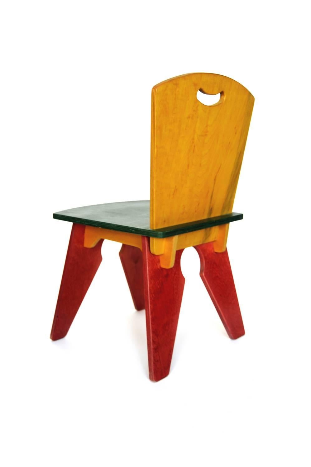 Red Yellow Green Notch Chair, USA, 1980s

Vintage, USA, 1980s
Painted Solid Wood
H 22.5 in, W 13 in, D 12 in (seat: H 12 in)

From a private child chair collection