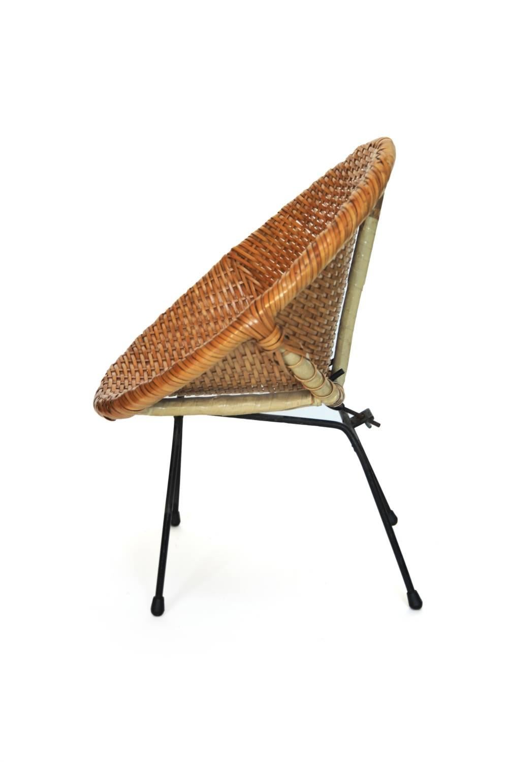 Round Coated Rattan Child Chair with Iron Legs, USA, 1950s

Vintage, USA, 1950s
Rattan and Iron
H 20 in, Dia 18 in (seat: H 9 in)

From a private child chair collection