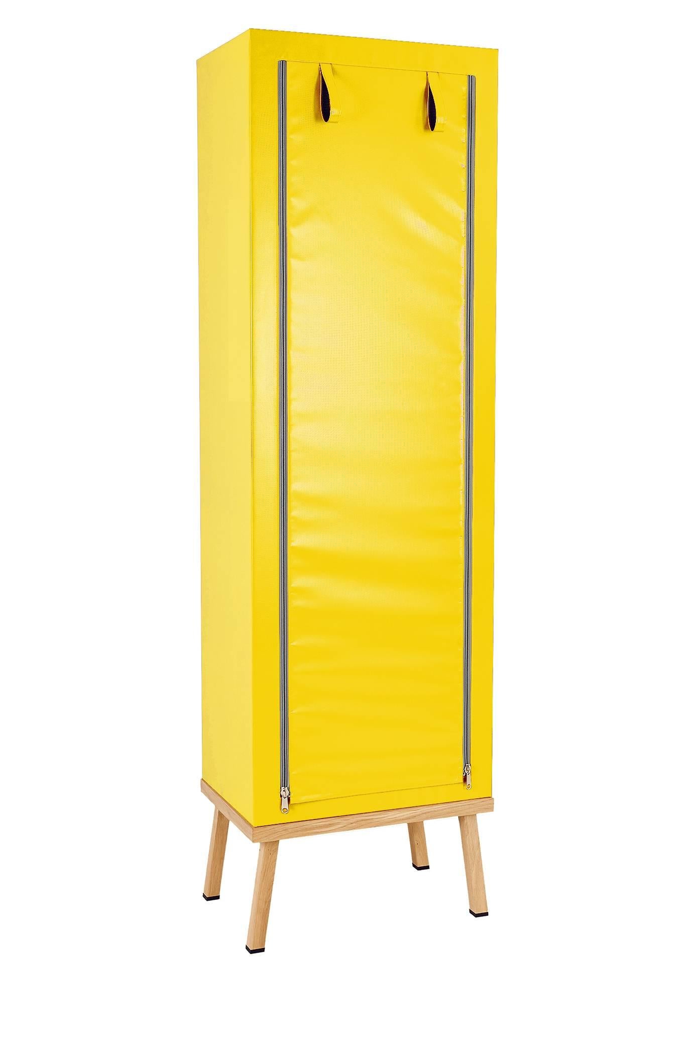 Visser and Meijwaard truecolors cabinet in yellow PVC cloth with zipper opening

Designed by Visser en Meijwaard 
Contemporary, Netherlands, 2015
PVC cloth, oakwood, rubber
Measure: H 78.75 in, W 23.75 in, D 15.75 in 

Lead time 8-10 weeks.