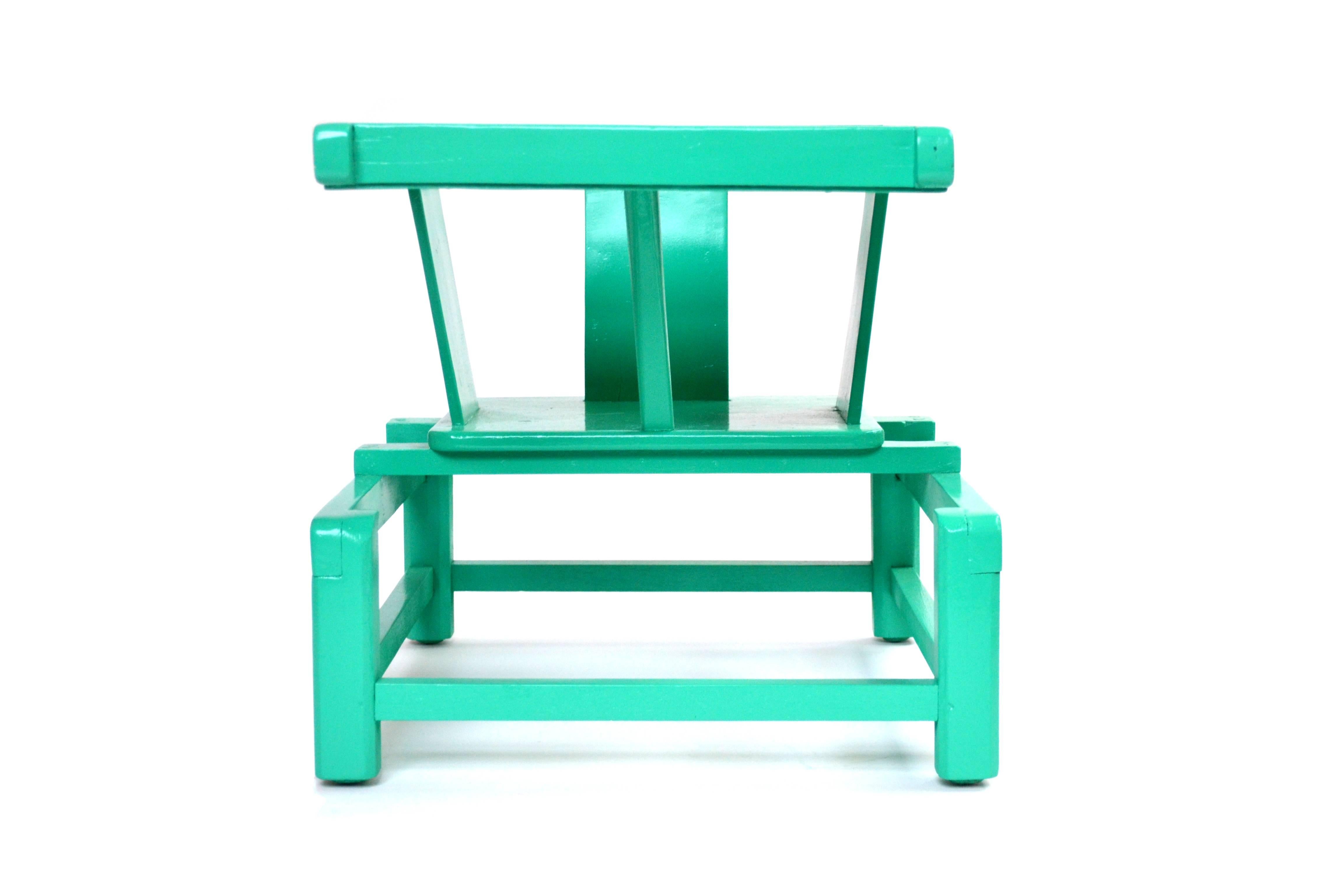 Mid-Century Modern Tot Play Chair in Teal Lacquered Wood 

USA
Wood, lacquer
H 17.75 in, W 15 in, D 21 in (seat: H 8.5 in)
