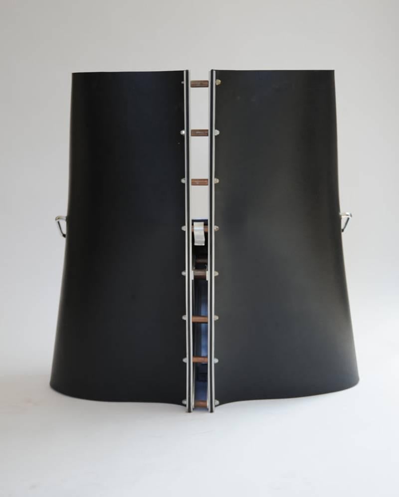 Henner Kuckuck black rubber and metal chair, circa 1990.

Materials: Rubber and metal.