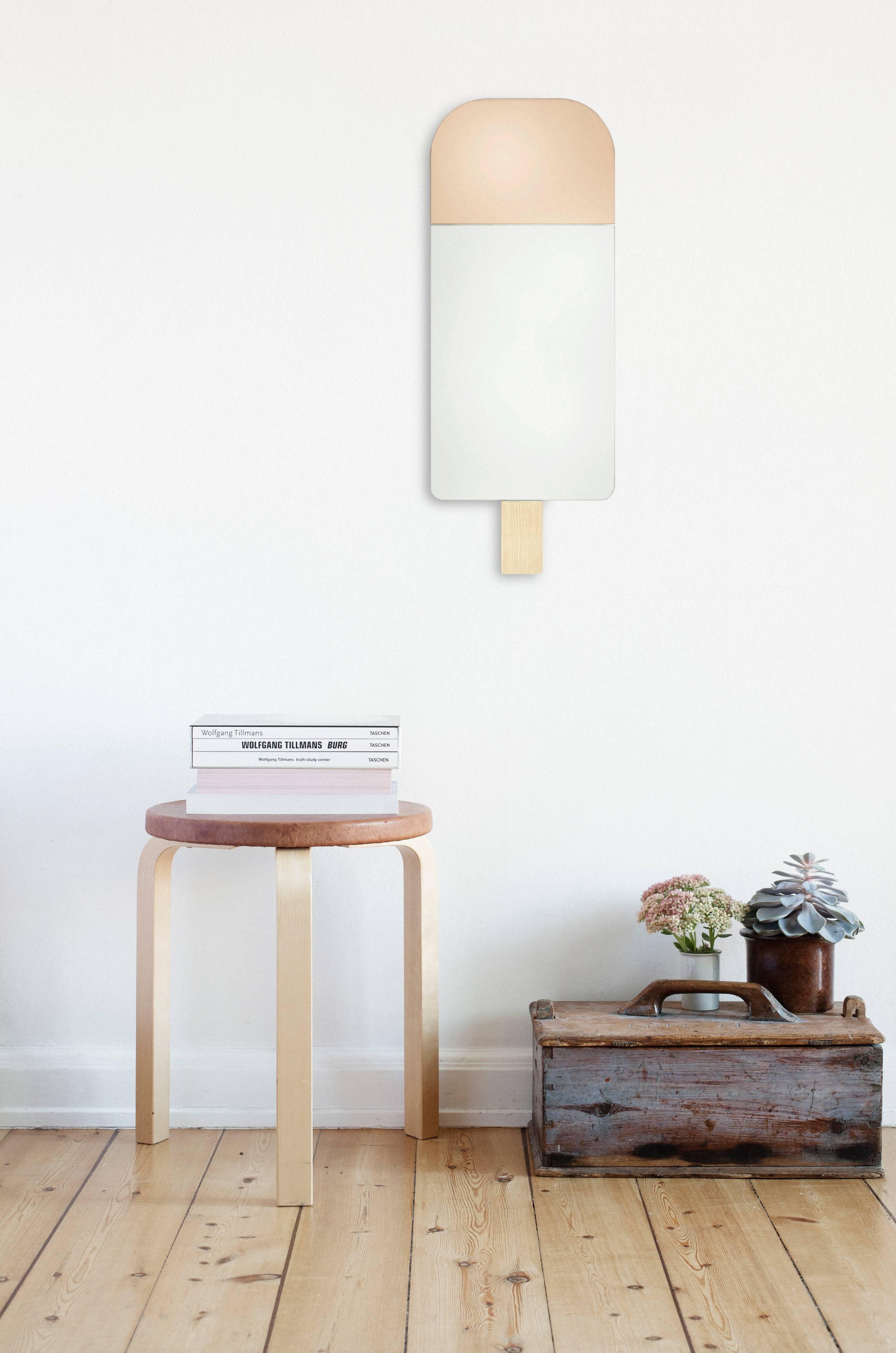 Ice cream mirror in warm rose by Tor and Nicole Vitner Servé.

Designed by Tor and Nicole Vitner Servé
Contemporary, Denmark, 2015
Warm rose and mirror glass, European oak
Measures: H 22 in, W 8.5 in

Also available in ocean blue, hazel brown,