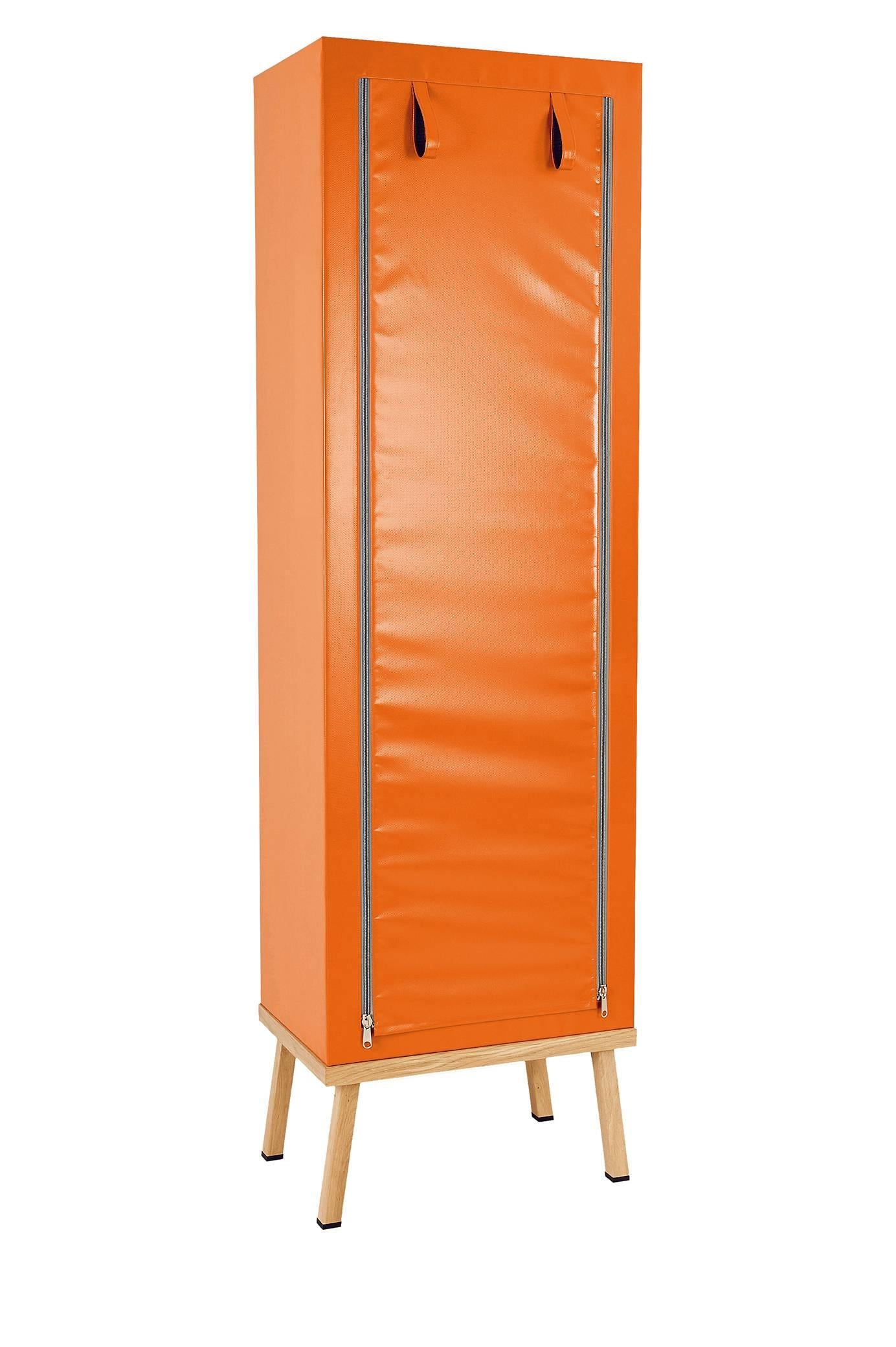 Visser and Meijwaard Truecolors cabinet in orange PVC cloth with zipper opening

Designed by Visser en Meijwaard 
Contemporary, Netherlands, 2015
PVC cloth, oakwood, rubber
Measure: H 78.75 in, W 23.75 in, D 15.75 in 

Lead time 8-10 weeks.