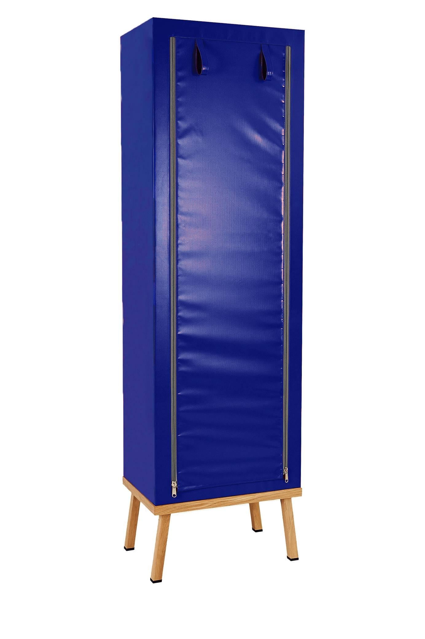 Visser and Meijwaard Truecolors cabinet in blue PVC cloth with zipper opening

Designed by Visser en Meijwaard 
Contemporary, Netherlands, 2015
PVC cloth, oakwood, rubber
Measures: H 78.75 inches, W 23.75 inches, D 15.75 inches. 

Lead time
