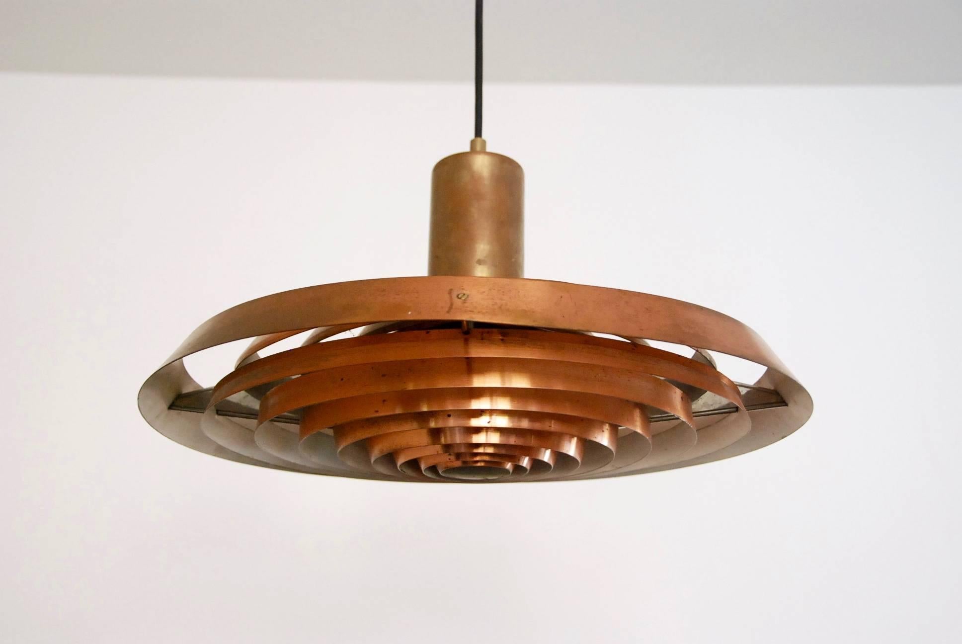 Beautiful pendant light in copper designed by Poul Henningsen for Louis Poulsen model 