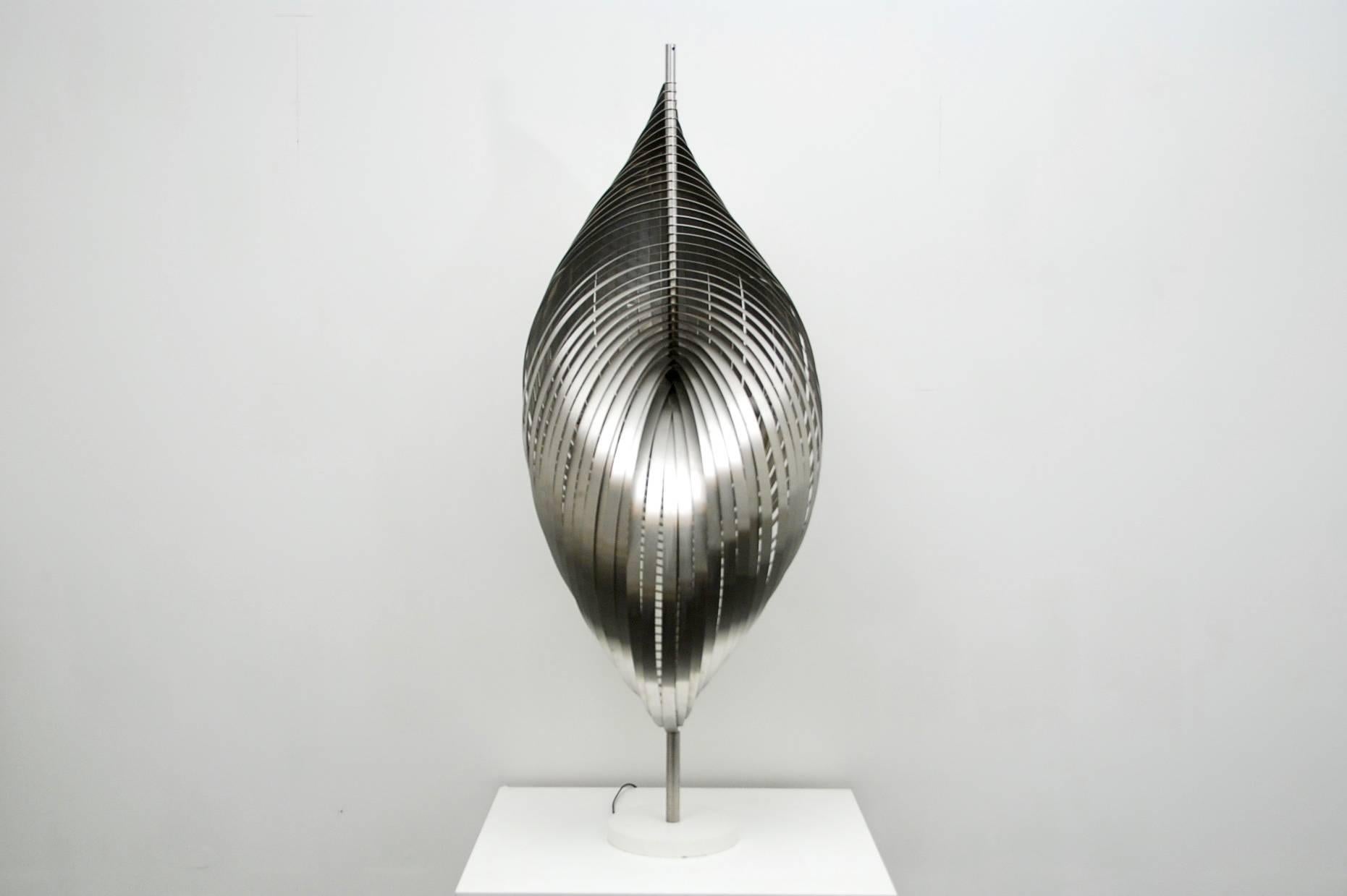 Exceptional floor lamp by designer Henri Mathieu, France, 1970s.
Brushed Aluminium blades, all original condition.