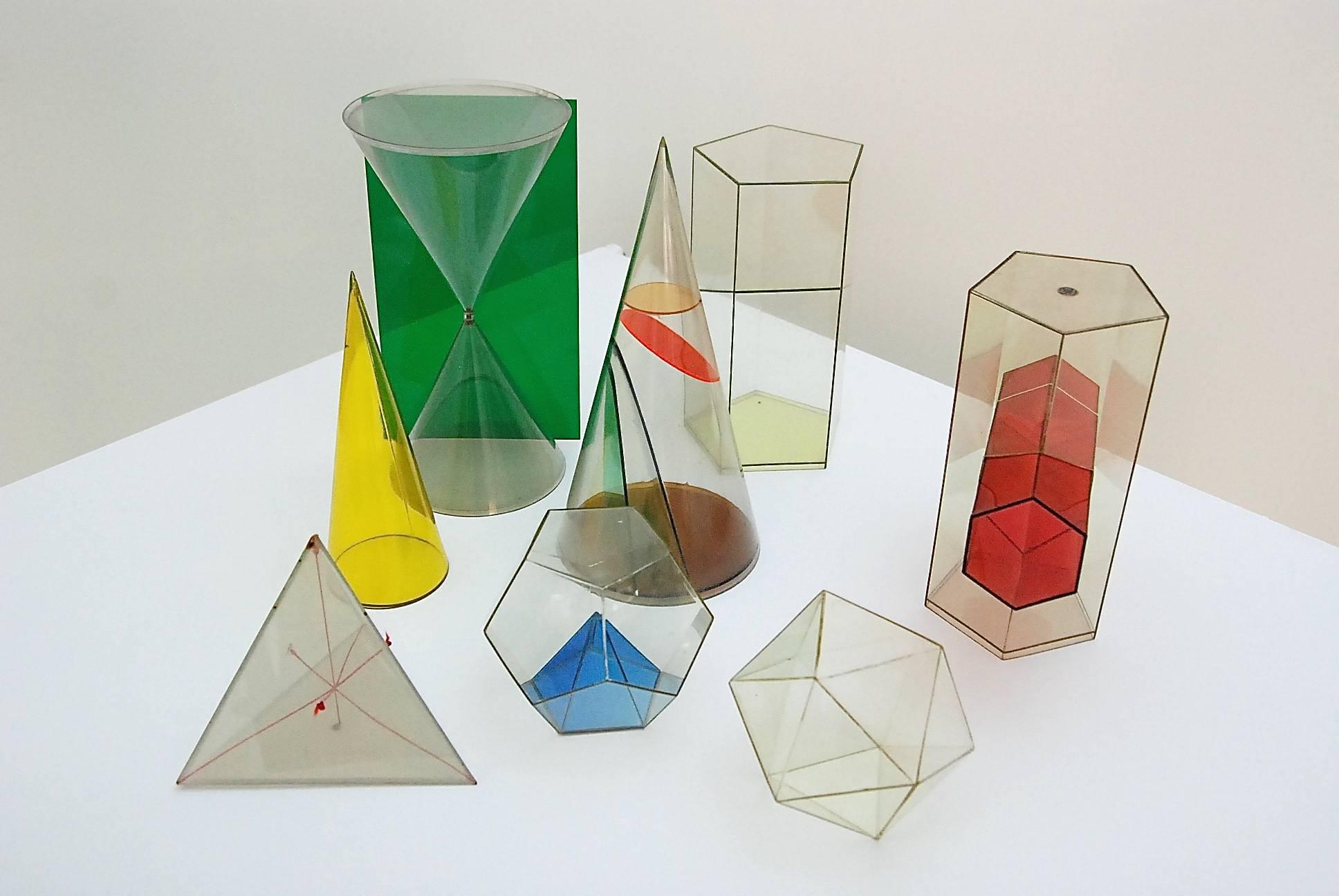 Collection of eight geometric solids made of plexiglass,
made in Germany, 1960s.