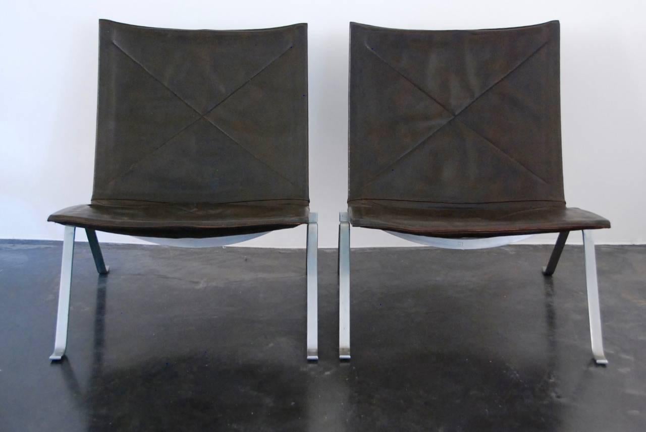 Poul Kjærholm PK22 pair of lounge chair for E. Kold Christensen, first edition, Denmark, 1956. All original condition, leather original patina deep brown color.