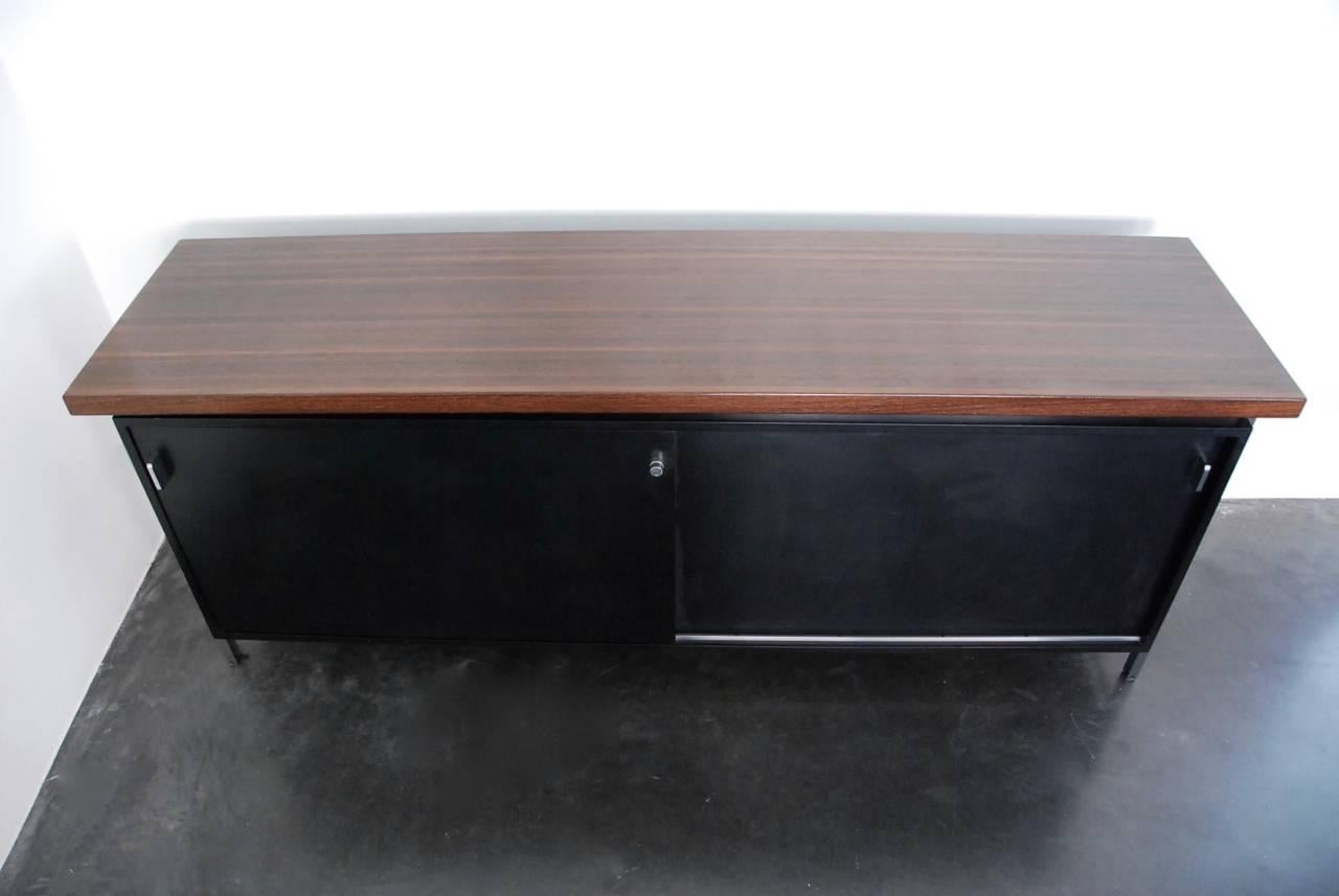 Buffet designed by Jules Wabbes, Belgium 1960s, top in solid wengé with black veneer doors on chromium plated steel feet.
 