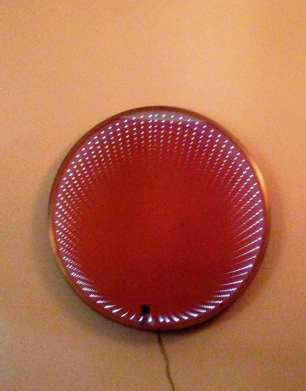 Original  large vintage  “Infinity” mirror that gives the effect of an infinitely regressing light tunnel. Rare in this dimensions.
This mirror has the manufactured date stamped in the back , it has been restored  with new transformer for actuals 