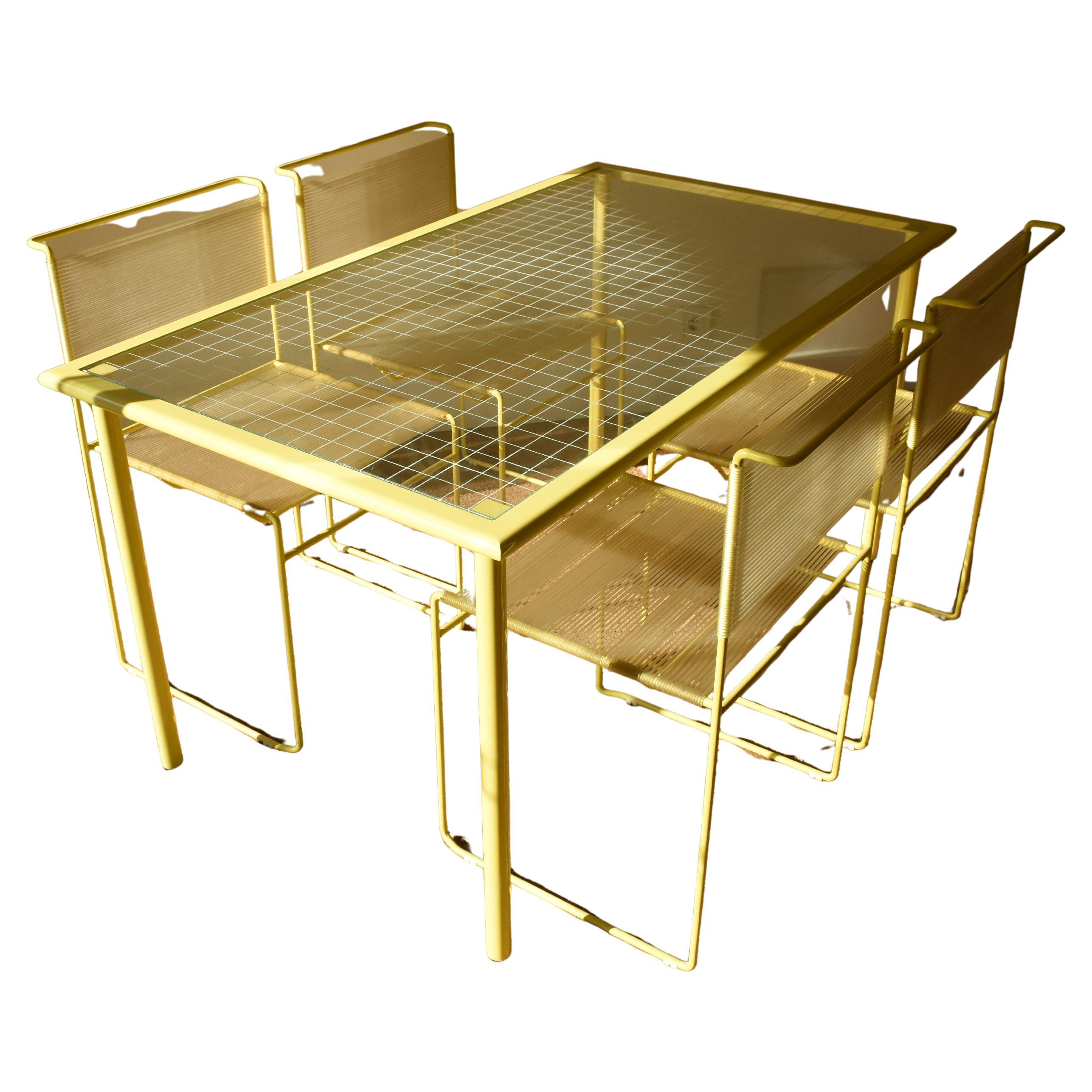 Set of four chairs and a table model 