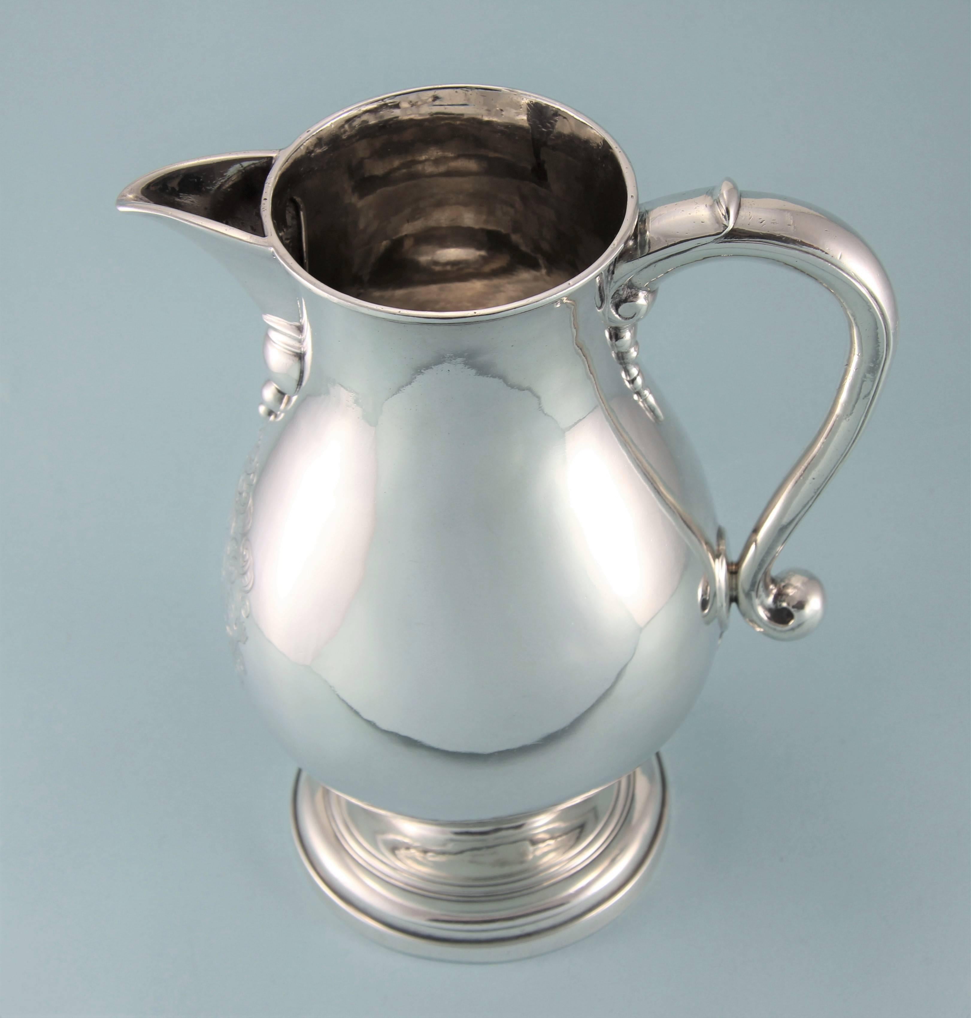 Excellent, rare and very elegant George I sterling silver beer jug. 
Maker: Samuel Margas in London, 1715. 

These jugs were very popular in the early 18th Century but not many of them have survived and very few in such good condition. Today,