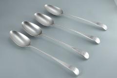George III Set of Four Sterling Silver Old English Feather Edge Serving Spoons