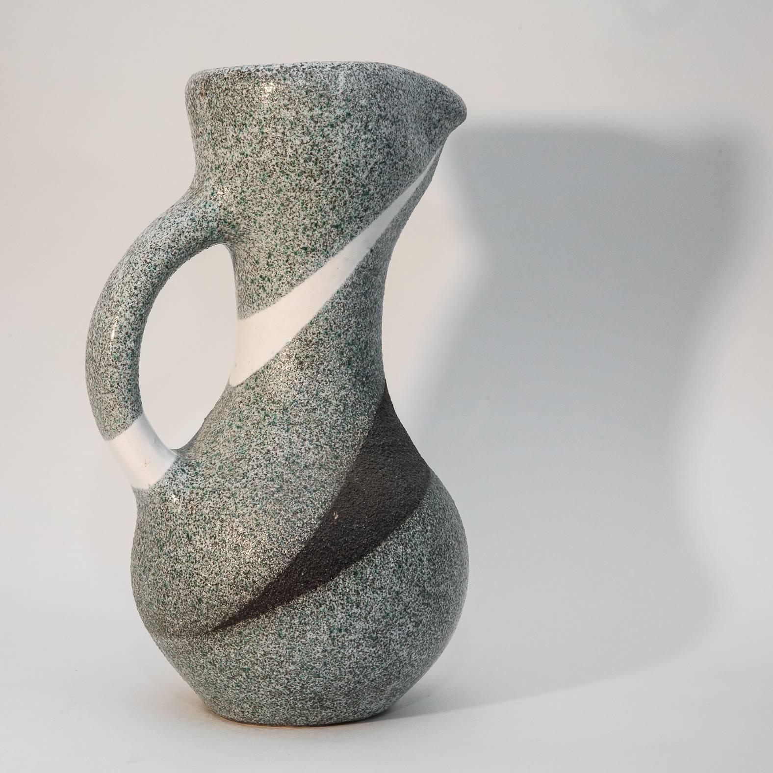A large zoomorphic abstract ceramic pitcher by Gilbert Valentin, one of the Vallauris leading figures and close friend of Picasso who had his ceramic studio across the street at the time
Signed.