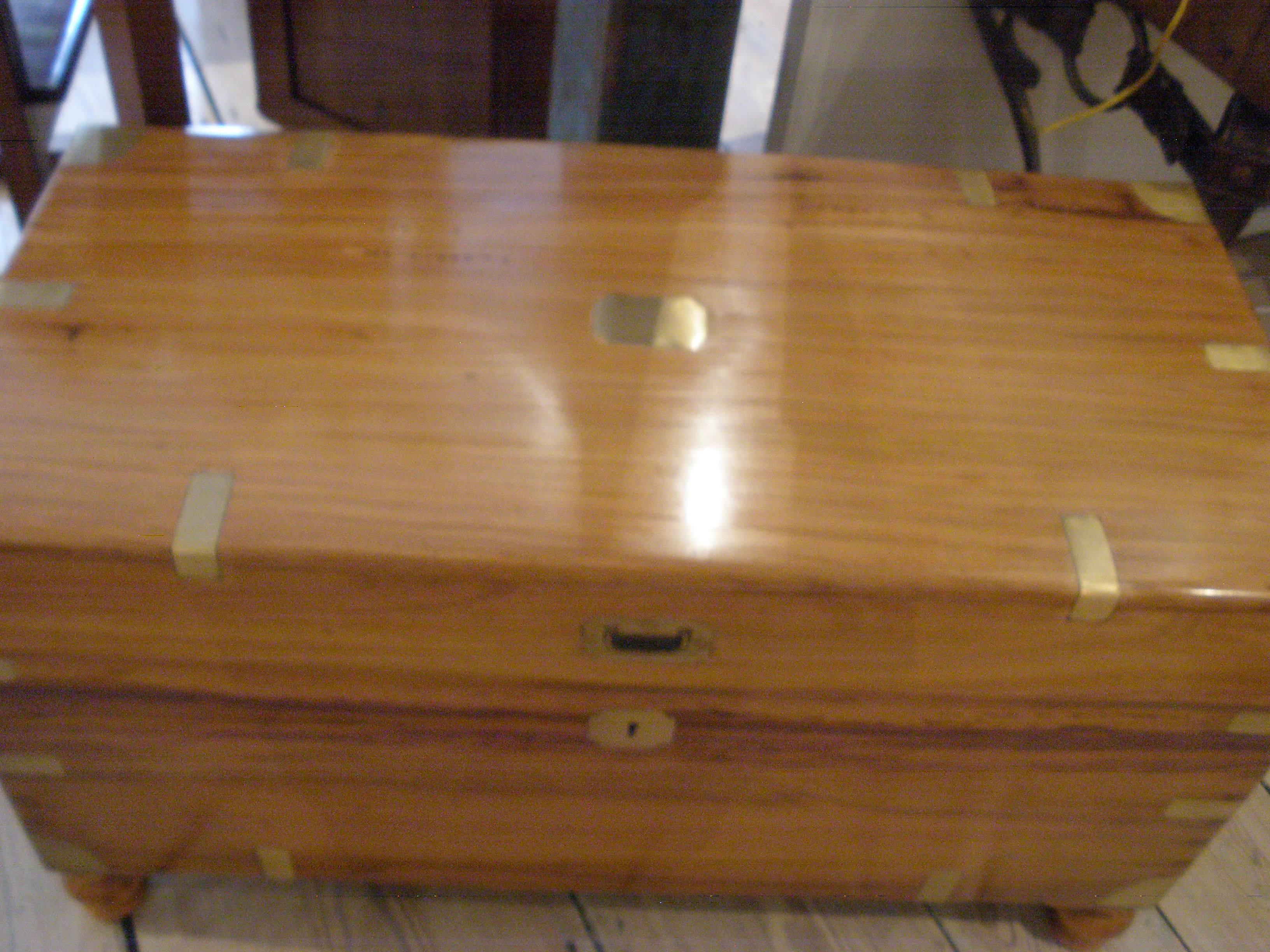 Late 19th century British Campaign camphor wood sea chest with dovetails, brass strap corners, brass handles, lock with keys (replaced) and added feet (which lends itself for use as a coffee table.) A nice larger size.

Lockhart Collection of