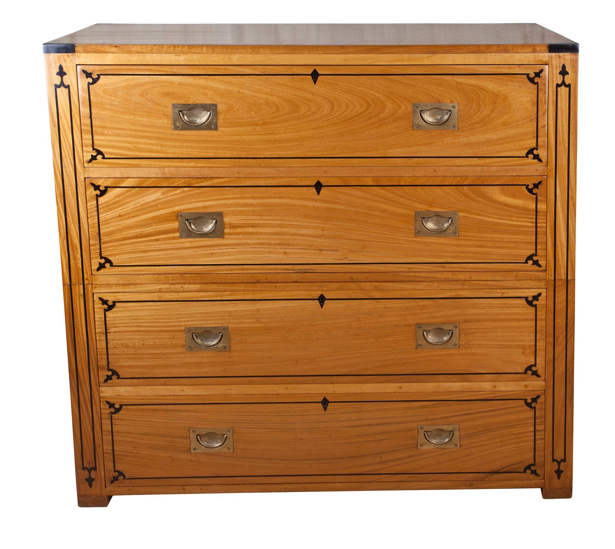 Mid-1900s British campaign secretary made of two very exotic and rare hardwoods. satinwood and ebony. Flush brass drawer pulls and fitted interior with secret compartments. The desk portion is 28 inches high. Perfect these days for tablets and
