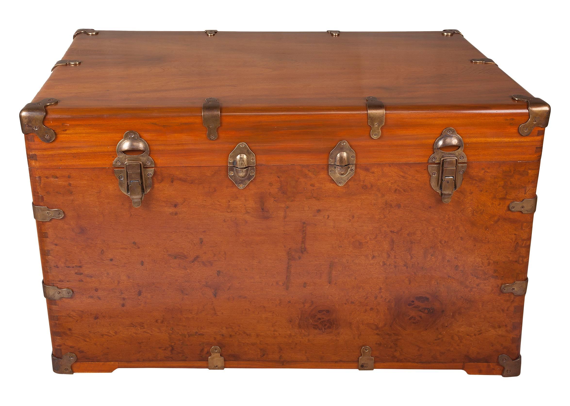 Handsome camphor wood sea chest with original brass hardware. Great dovetails and burl wood front, late 19th century, English. Refinished.