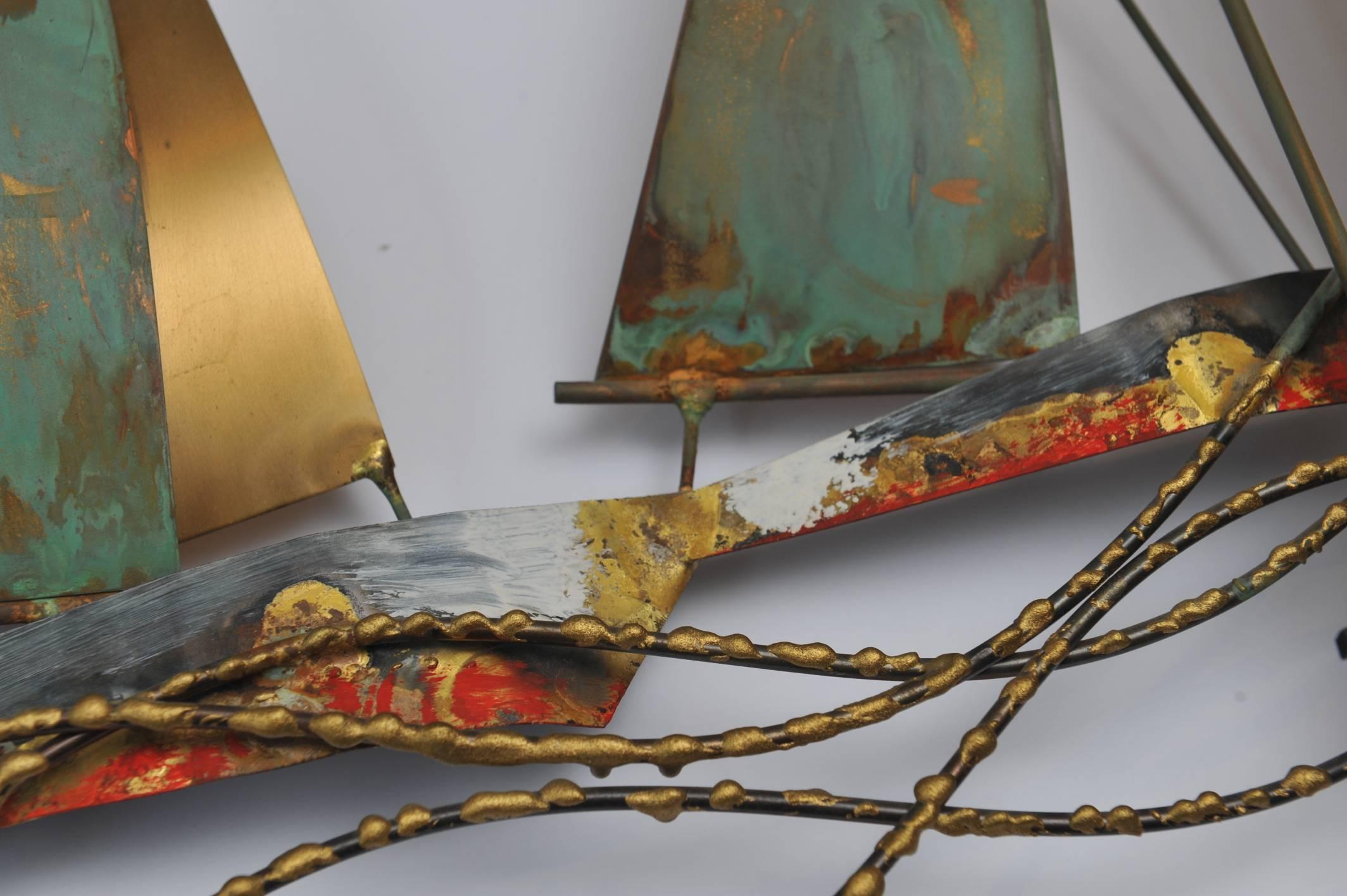 Signed and dated Curtis Jeré (Curtis Freiler and Jerry Fells) racing sailboats wall sculpture. Brass and copper with original patina, mounting brackets on reverse side. Brutalist period, 1969. These pieces are becoming highly collected as the