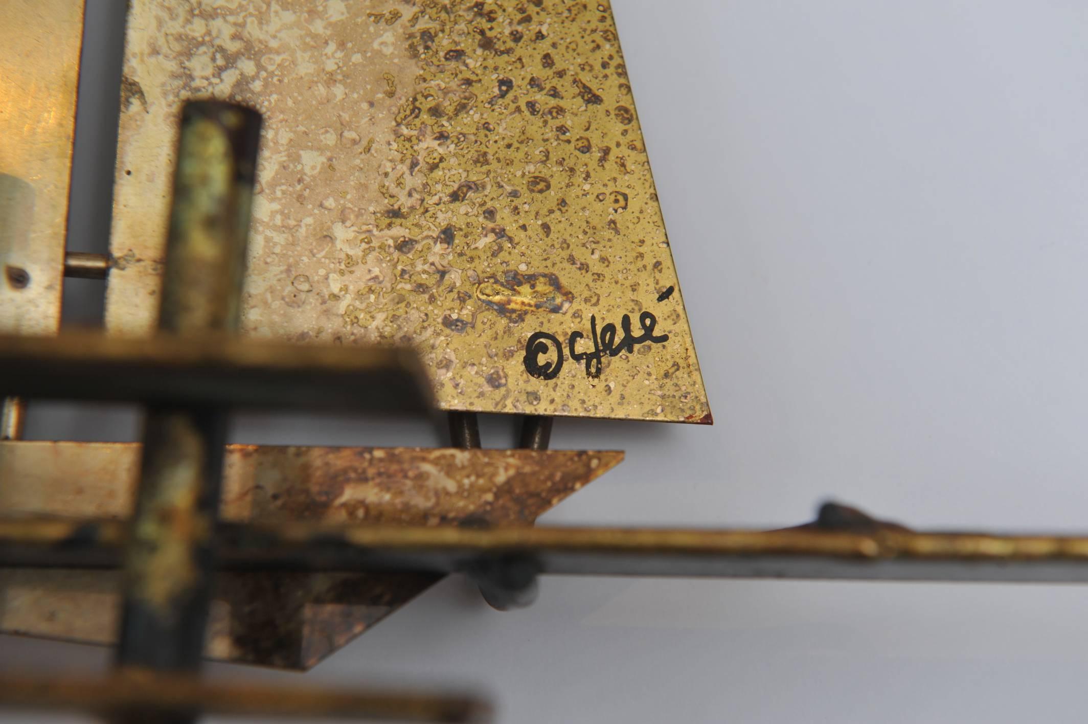 Signed and dated (1979) brass sailboat sculpture by Curtis Jere (the duo of Curtis Freiler and Jerry Fells) from the Brutalist period. In great condition with nice patina. These pieces are highly collectible as these artists are no longer with us.