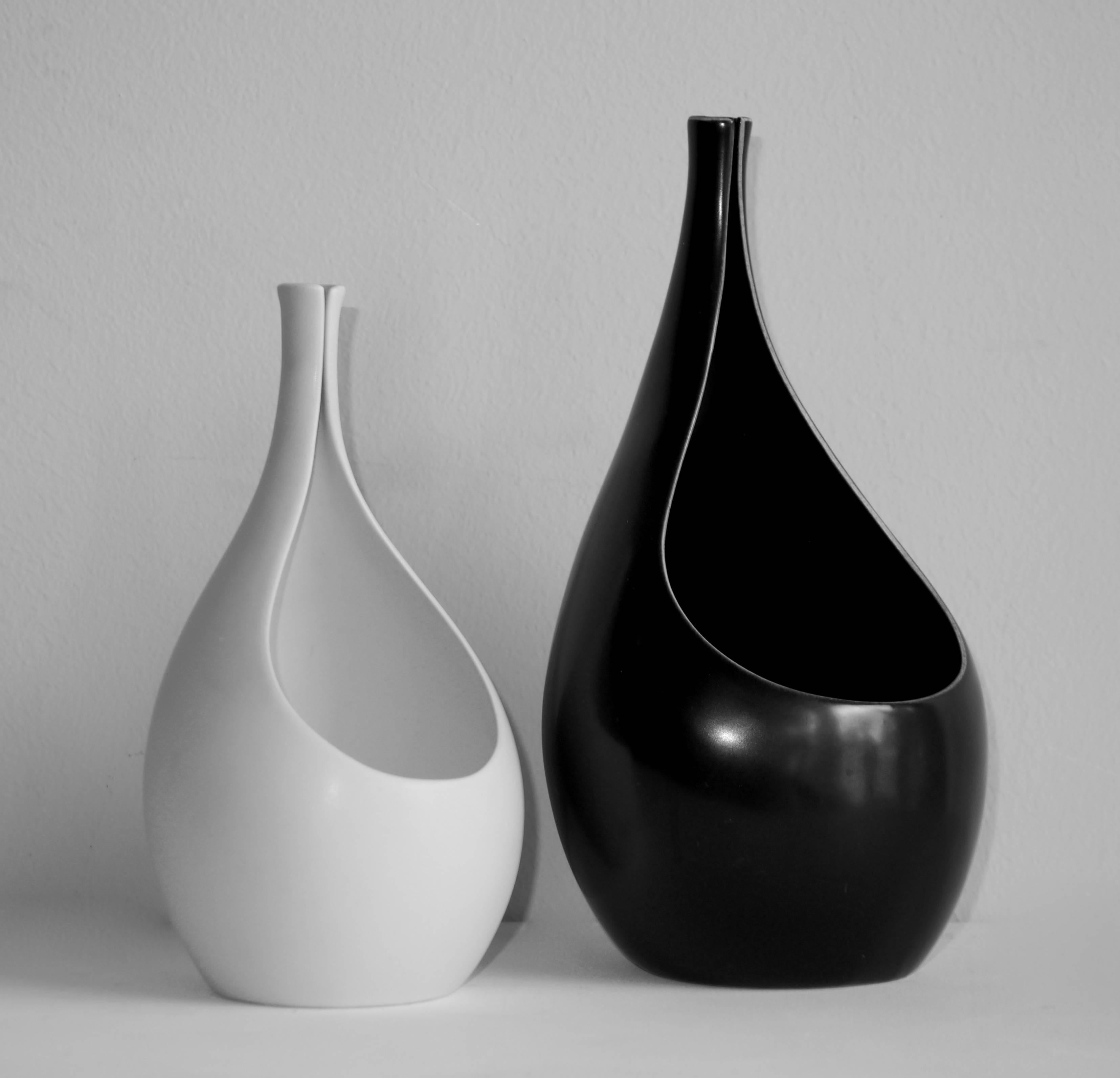 Two 1953 black and white ceramic vases of the 