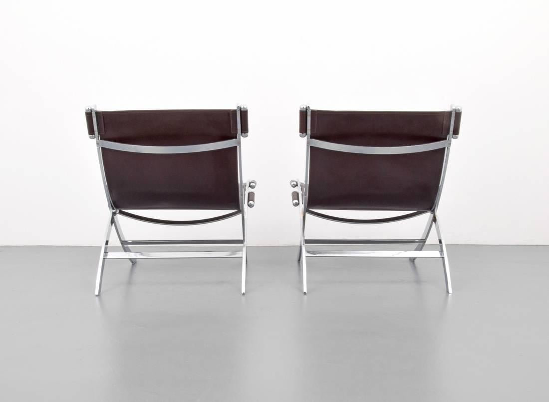 Gorgeous leather and chrome lounge chairs by Flexform ITALY