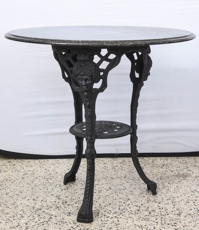 Beautiful ornate iron and marble cafe table from Italy, 1970s.