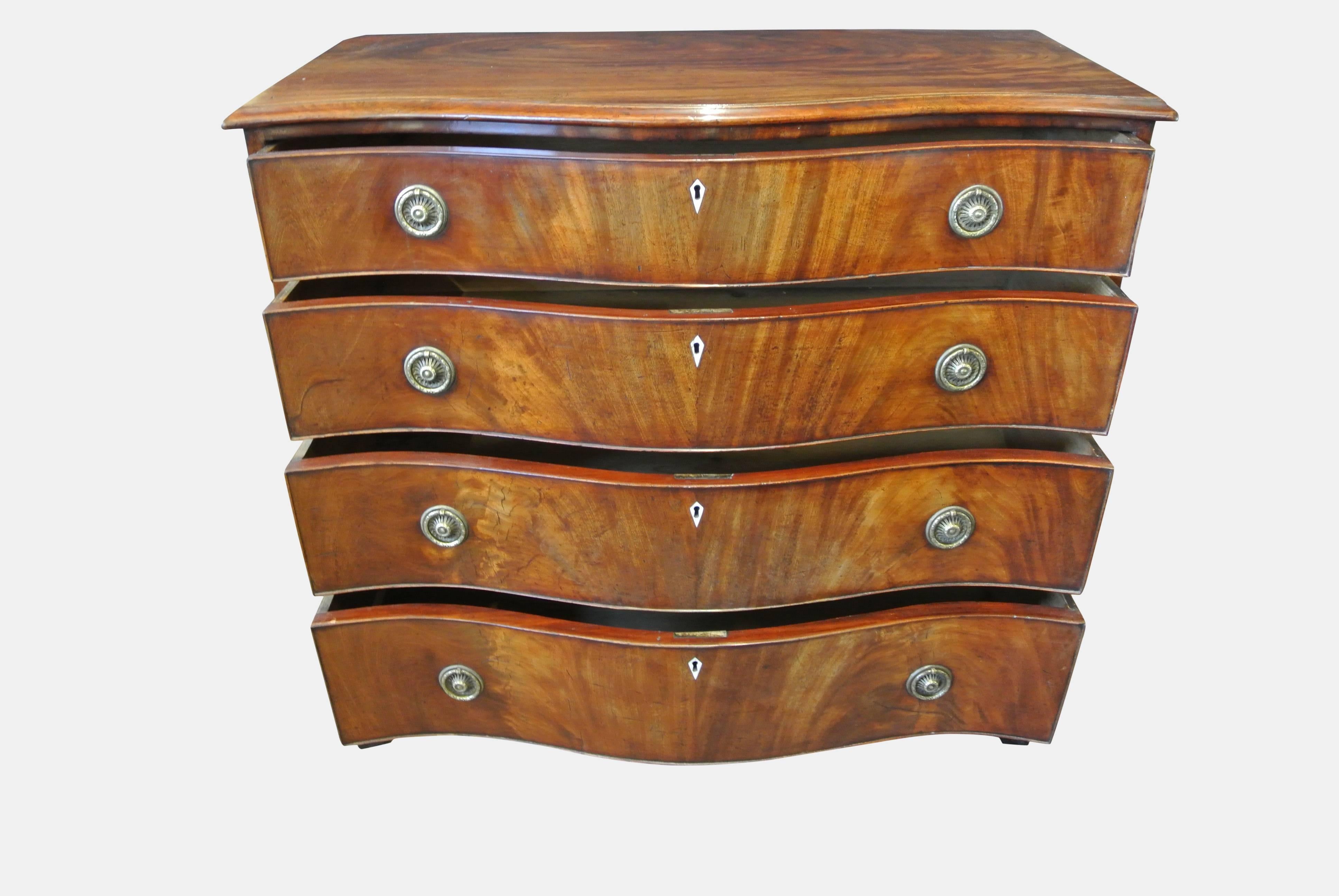 serpentine chest of drawers