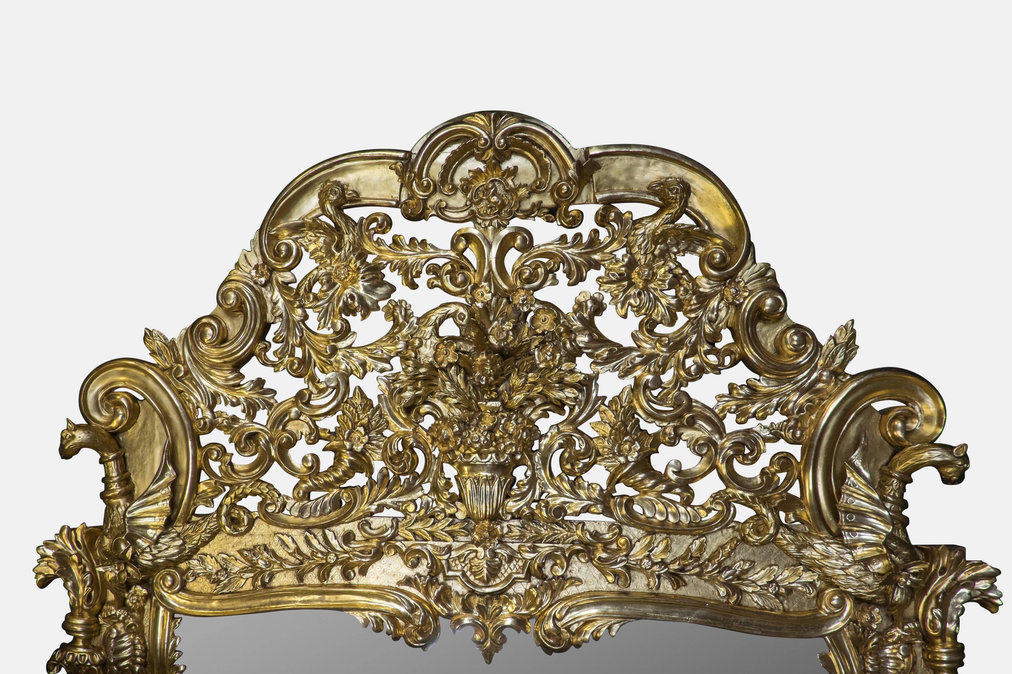 Pair of very large 19th century Italian Baroque mirrors with elaborate gilt frames, with good provenance. Recently regilded in 23.5-carat gold by master gilders