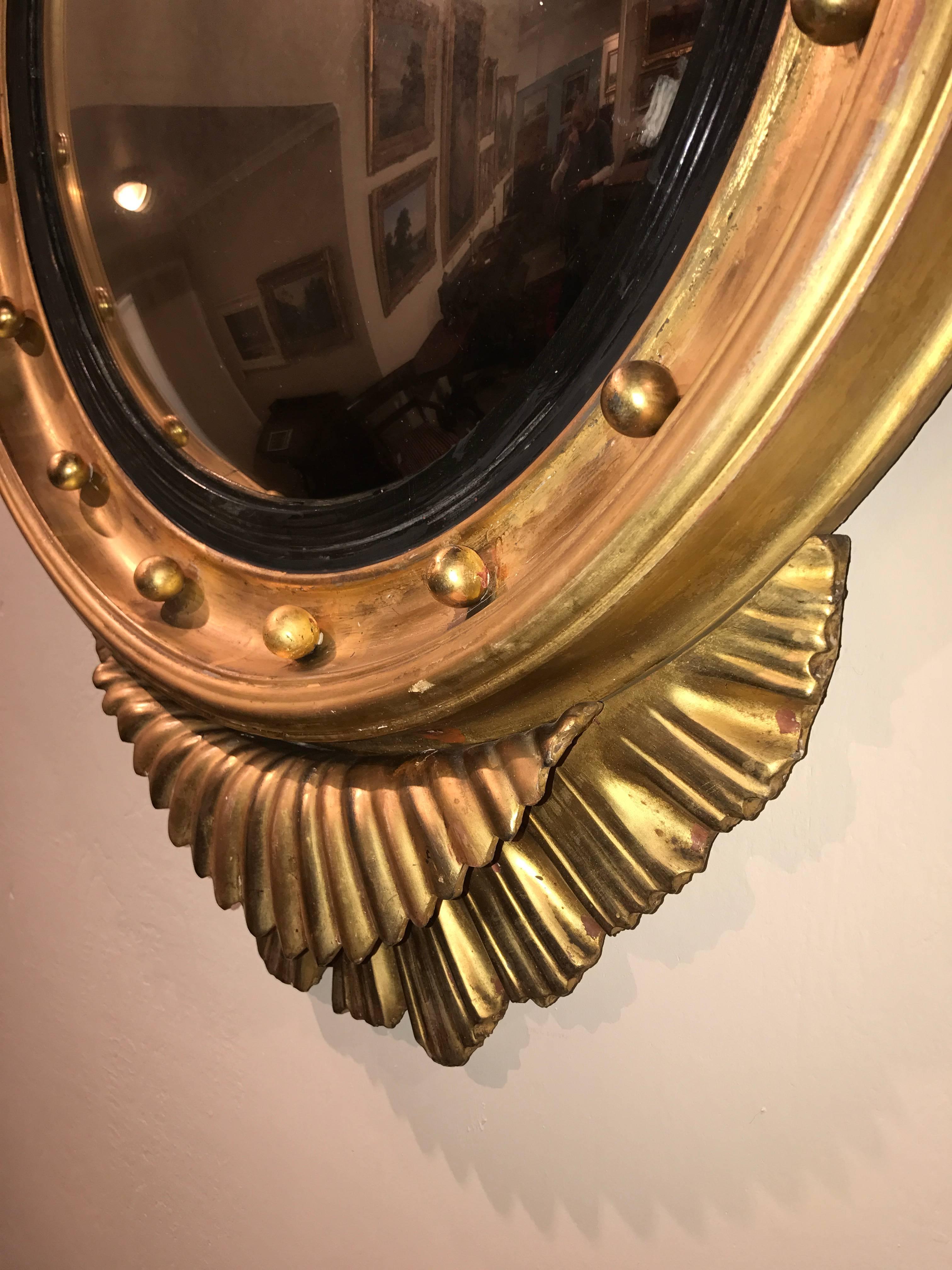 English 19th Century Eagle Crested Convex Gilt Mirror