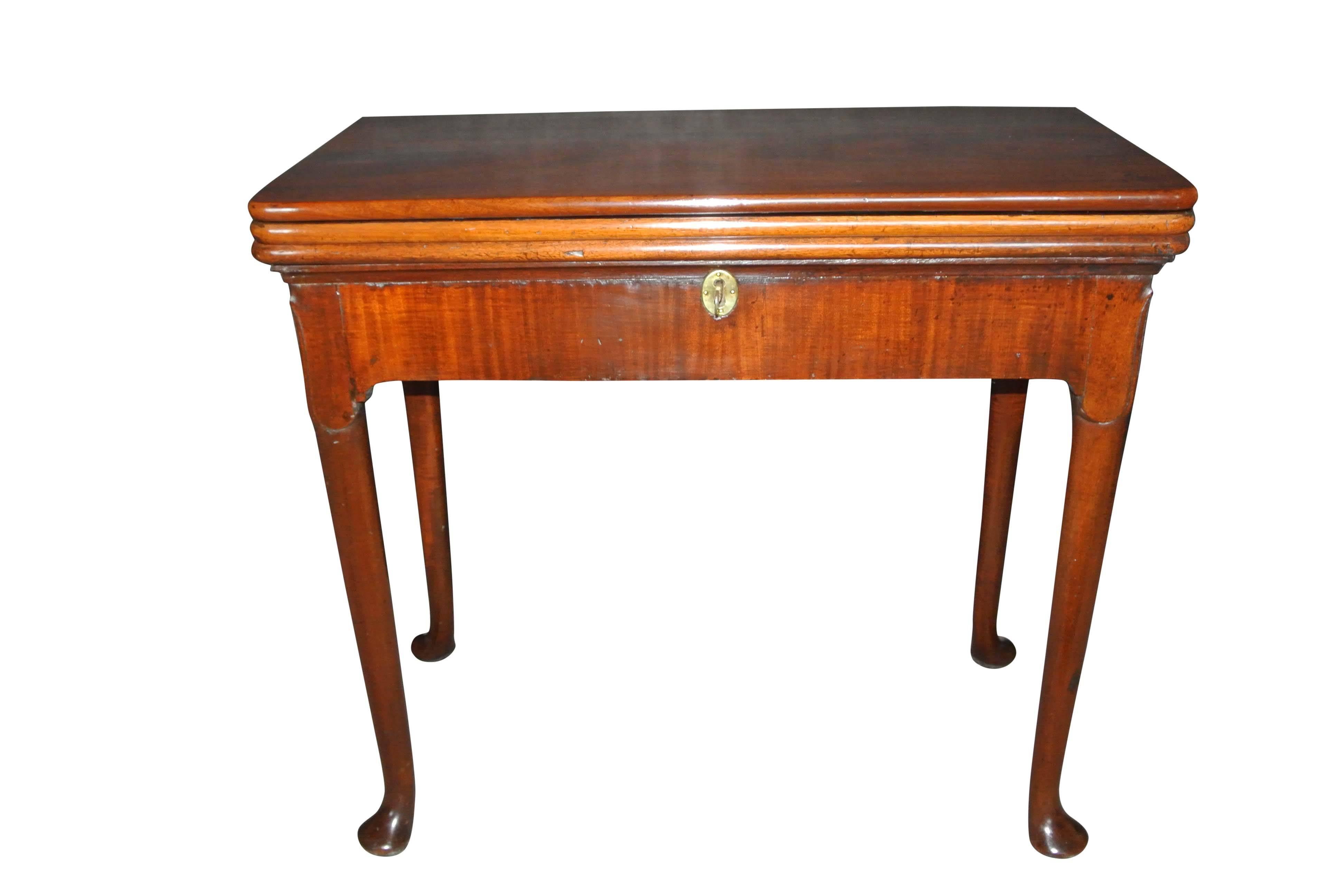 A rare antique George ii triple top mahogany backgammon and cards table with locking concertina action back legs on tapering legs and pad feet. Excellent condition.
