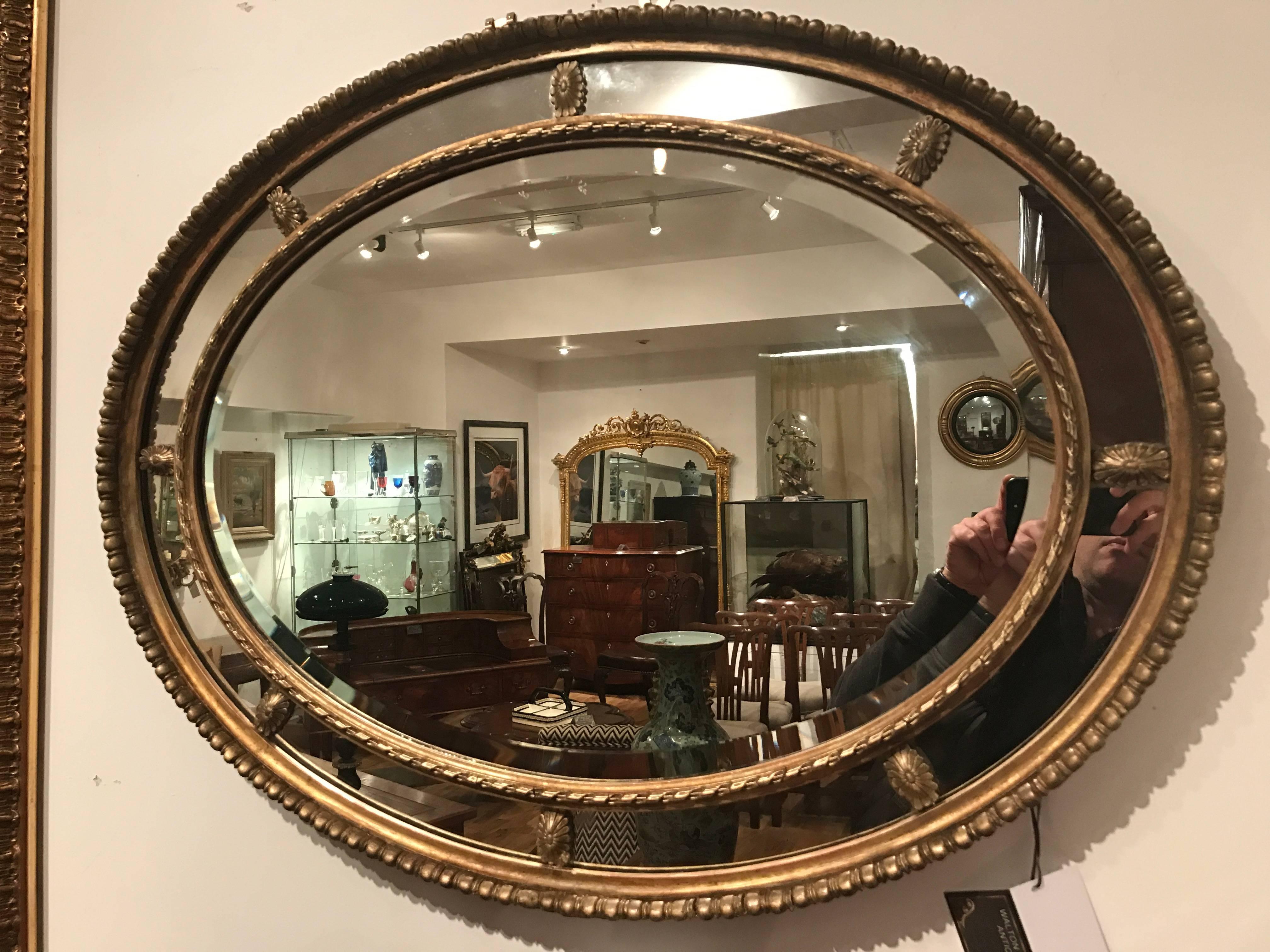 Adam Style Early 20th Century Oval Segmented Gilt Mirror