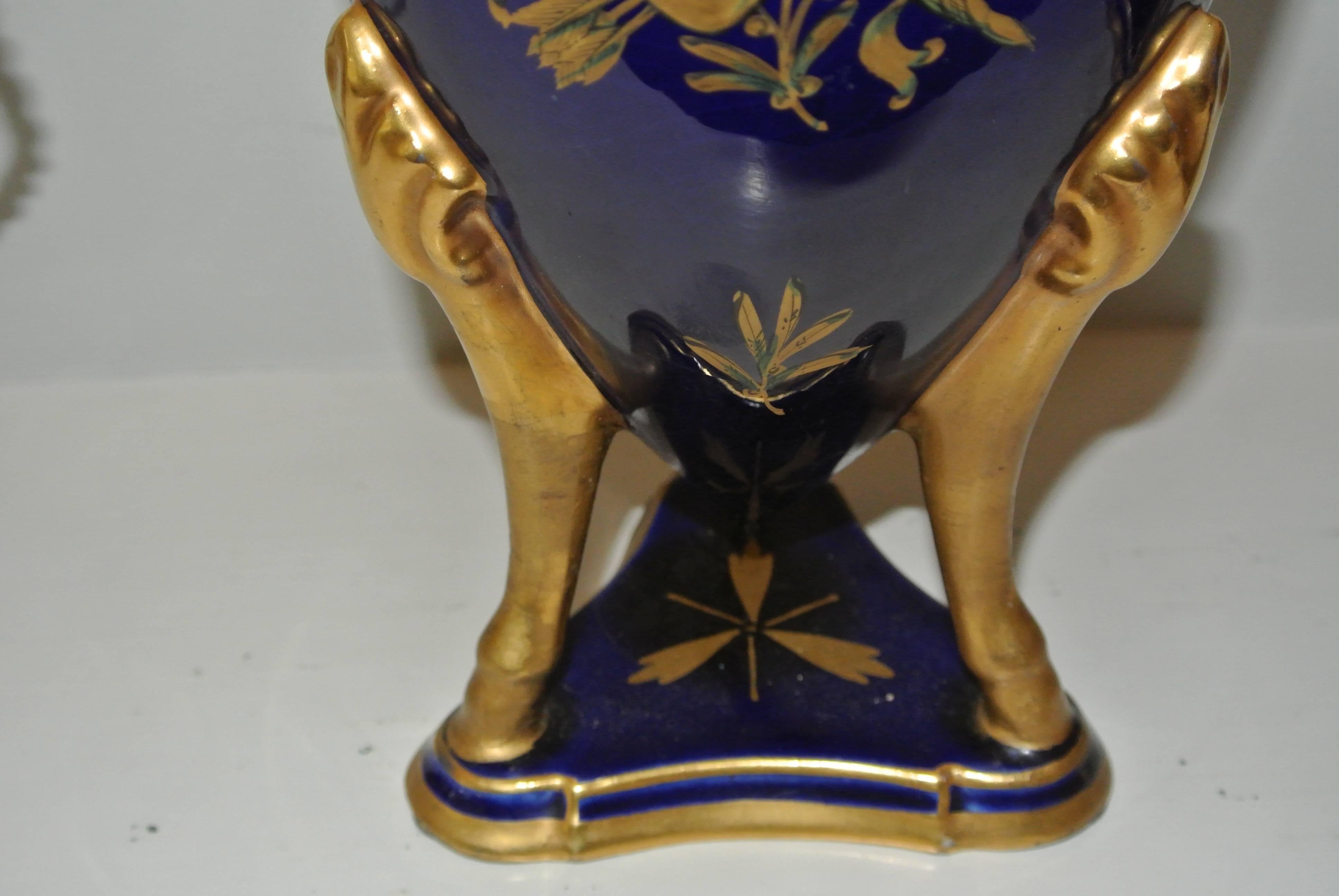 Beautiful pair of late 1920s French Art Deco faience vase lamps with gold leaf decoration signed Pinon Heuzé. The lamp part can be taken out if not required.