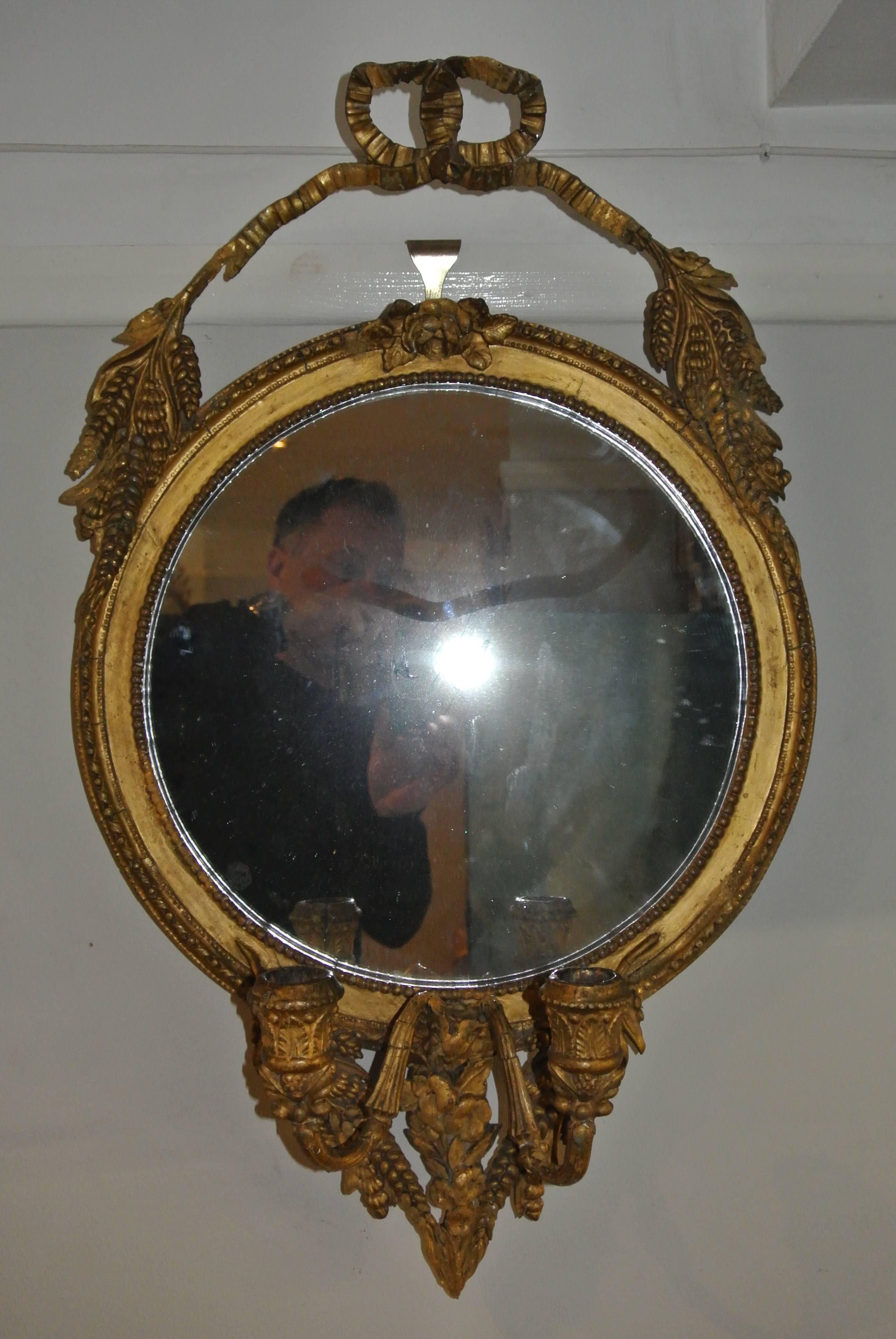 19th Century Pair Of Giltwood And Gesso Circular Girandole Mirrors With Floral And Barley Decoration. In Original Condition.
