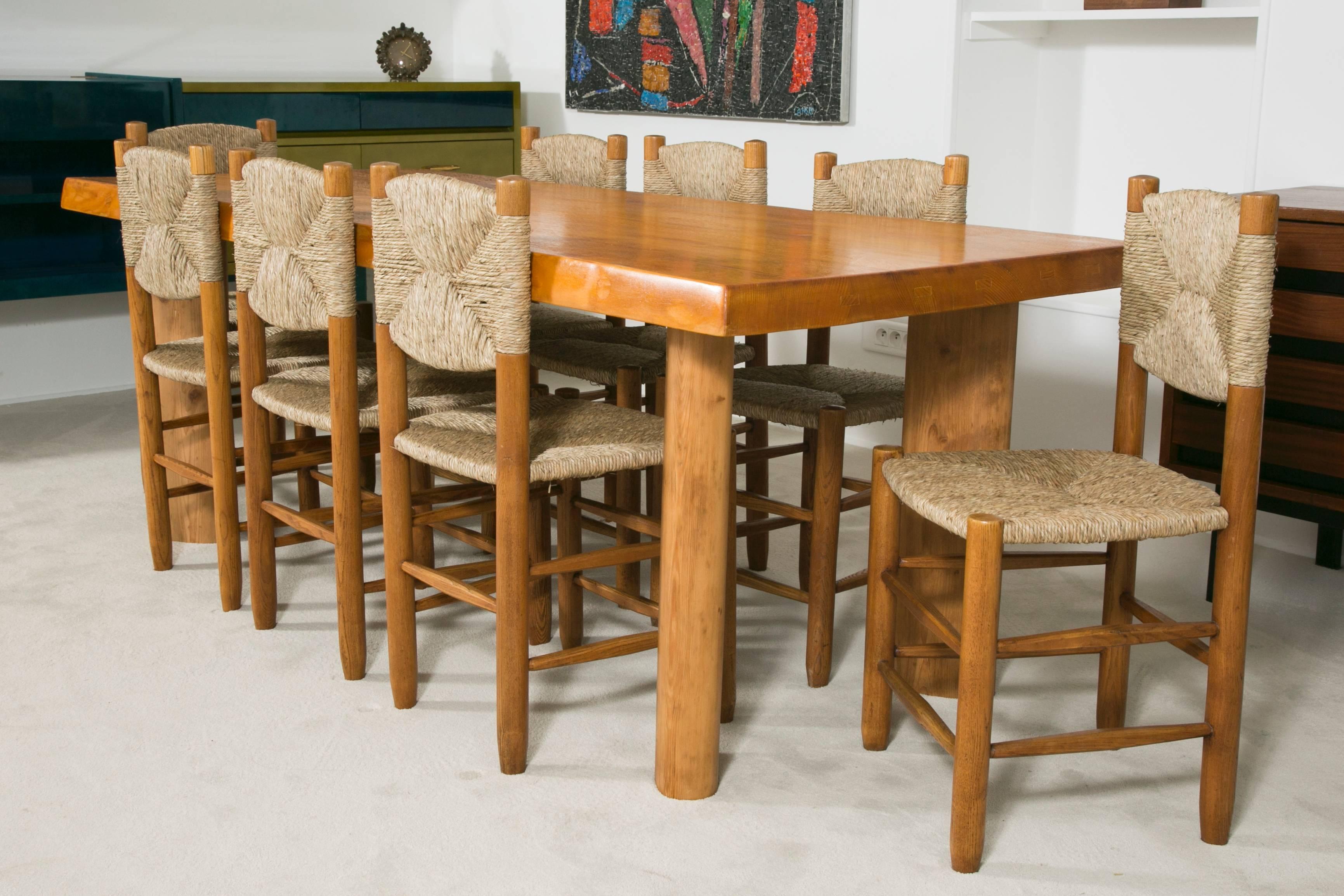 French Dining Table and Eight Chairs by Charlotte Perriand, circa 1950