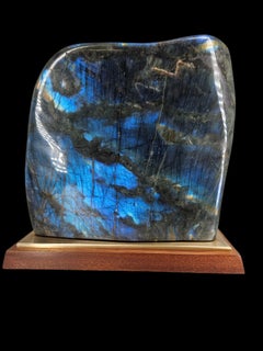 Great quality, Huge Labradorite from Madagascar (10kg+) on wood and brass stand