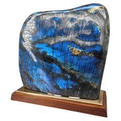 Great quality, Huge Labradorite from Madagascar (10kg+) on wood and brass stand