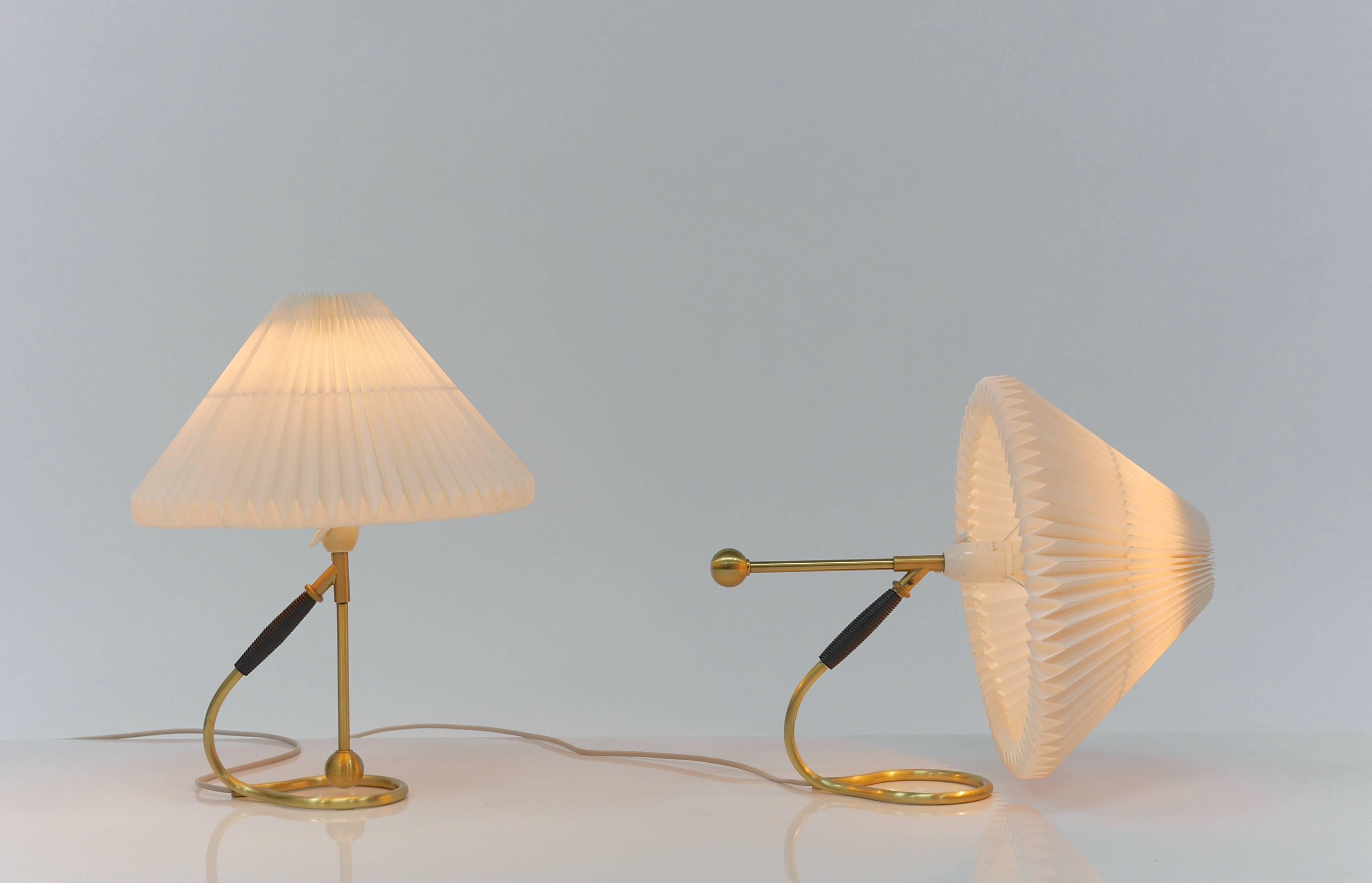 Pair of vintage Le Klint of 306 lmaps ( Kip-lampen in Danish )
This versatile lamp was designed by Kaare Klint in 1945.
With it’s tilt function the design easily converts from a table lamp to wall sconce and vice versa.