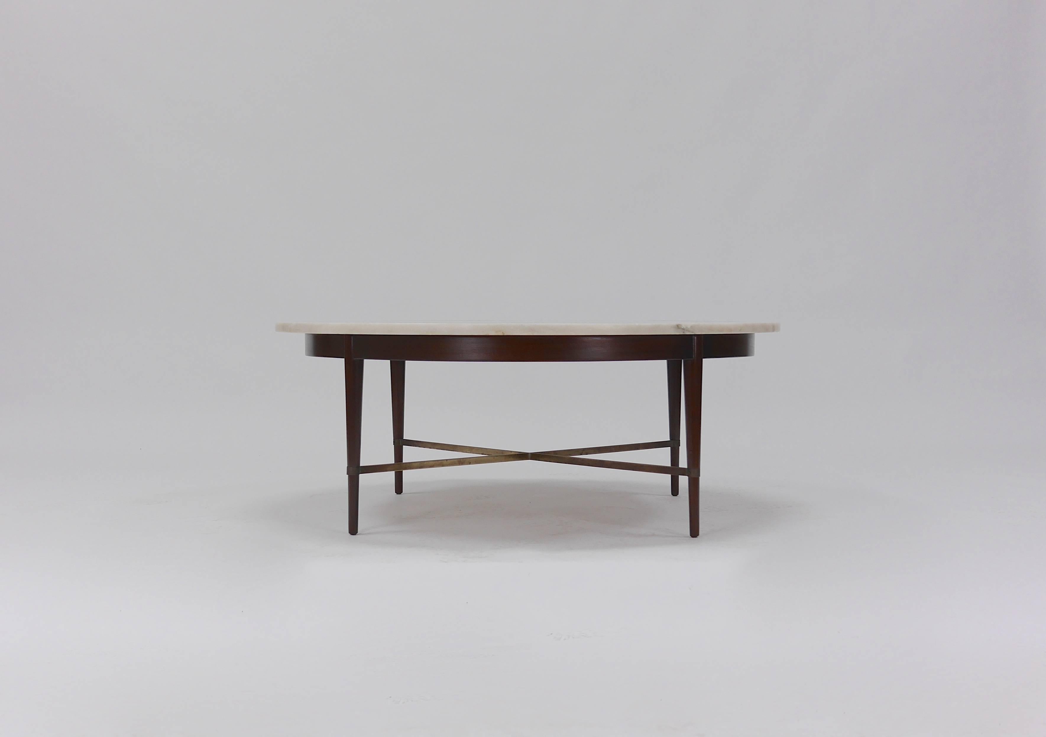 Marble and brass coffee table by Paul McCobb. Mahogany frame, brass stretchers, marble top.