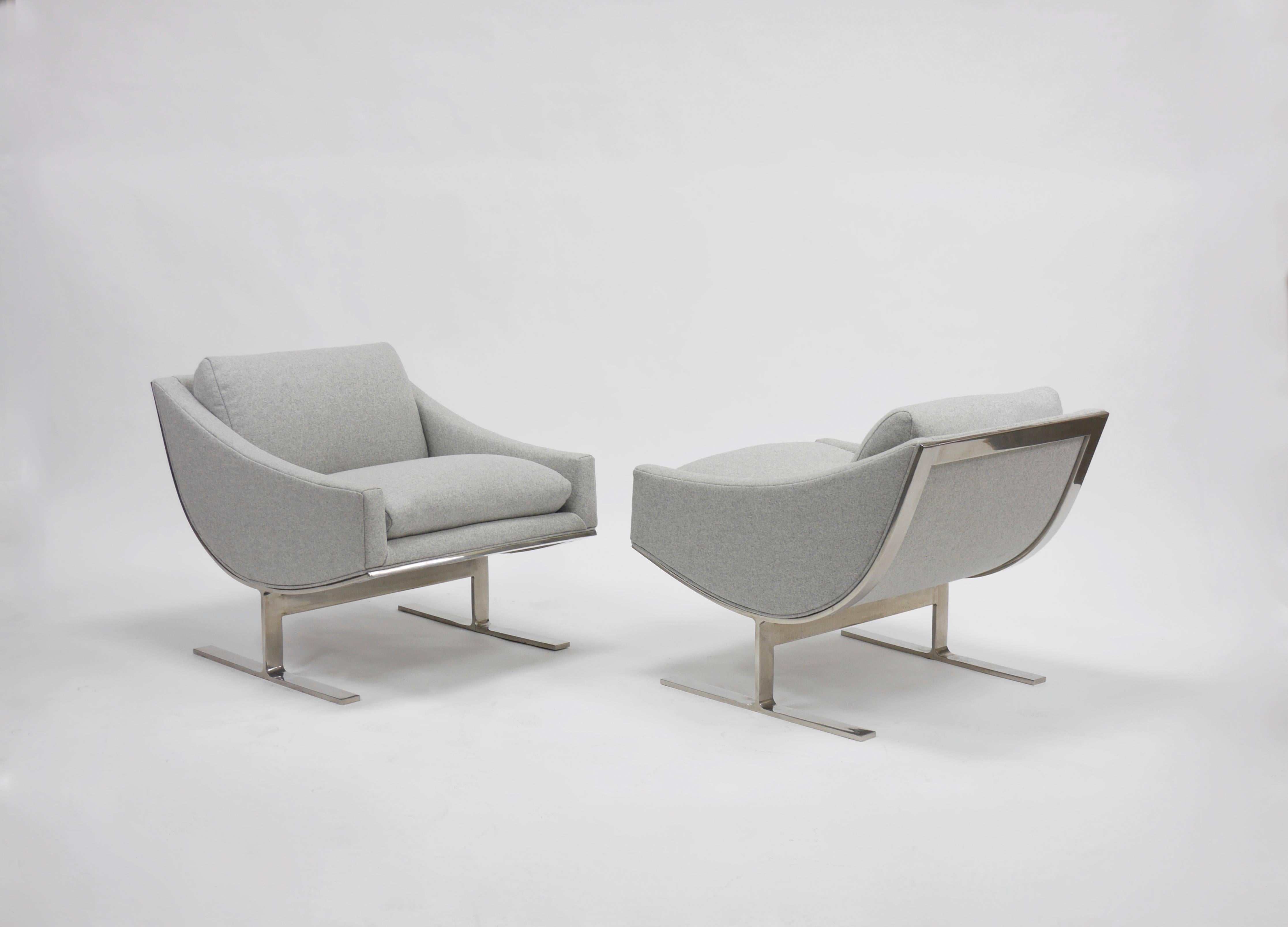 Pair of Kipp Stewart for Directional "Arc" lounge chairs, 1/2" thick polished stainless frames. Great looking, very well made and comfortable.
 Reupholstered in Kvadrat Divina Melange color way 120.