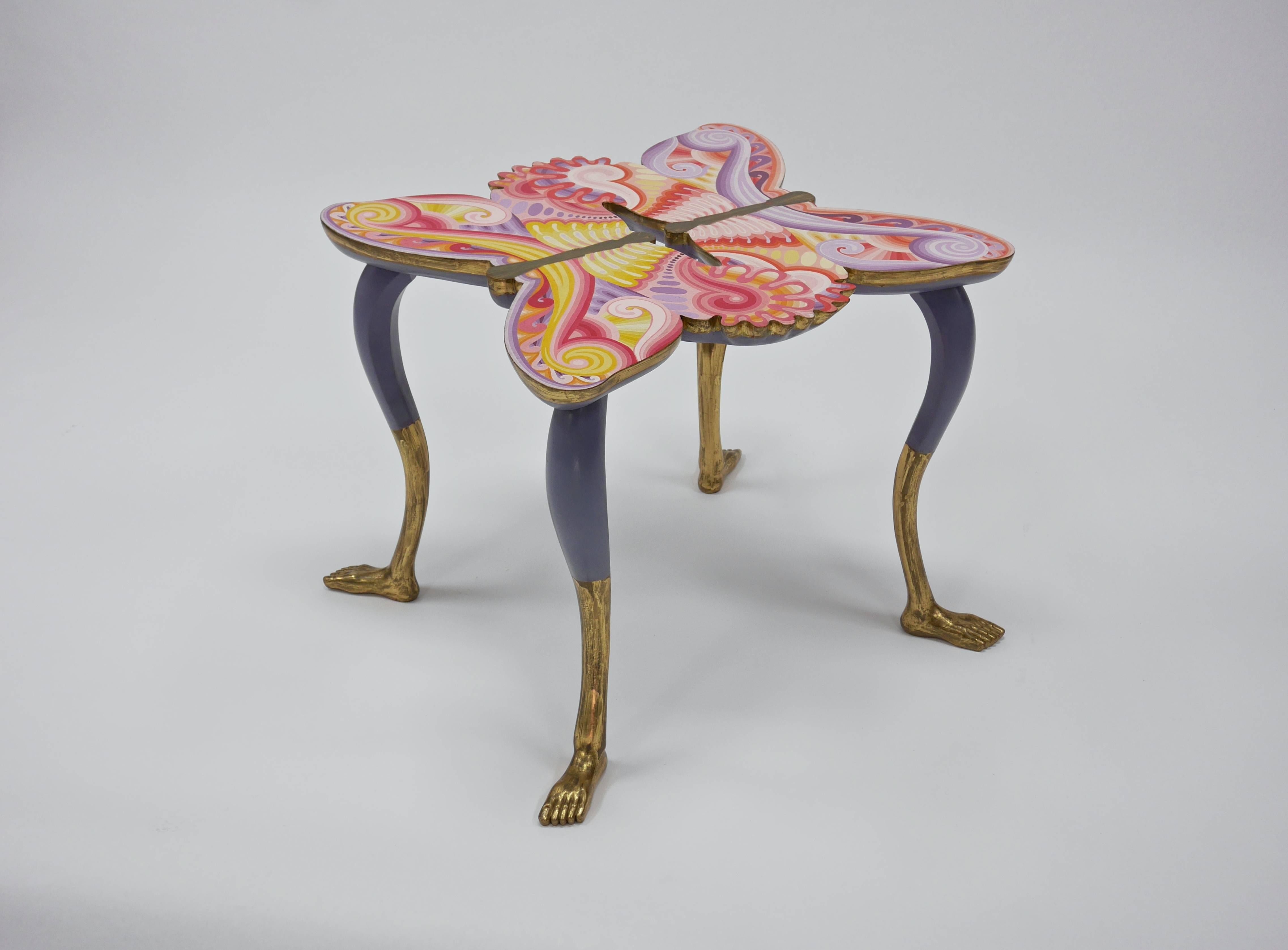 Rare Pedro Friedeberg (Mexican, b. 1936) mariposa table.
Hand-painted in bright colors and gilded legs. Signed 