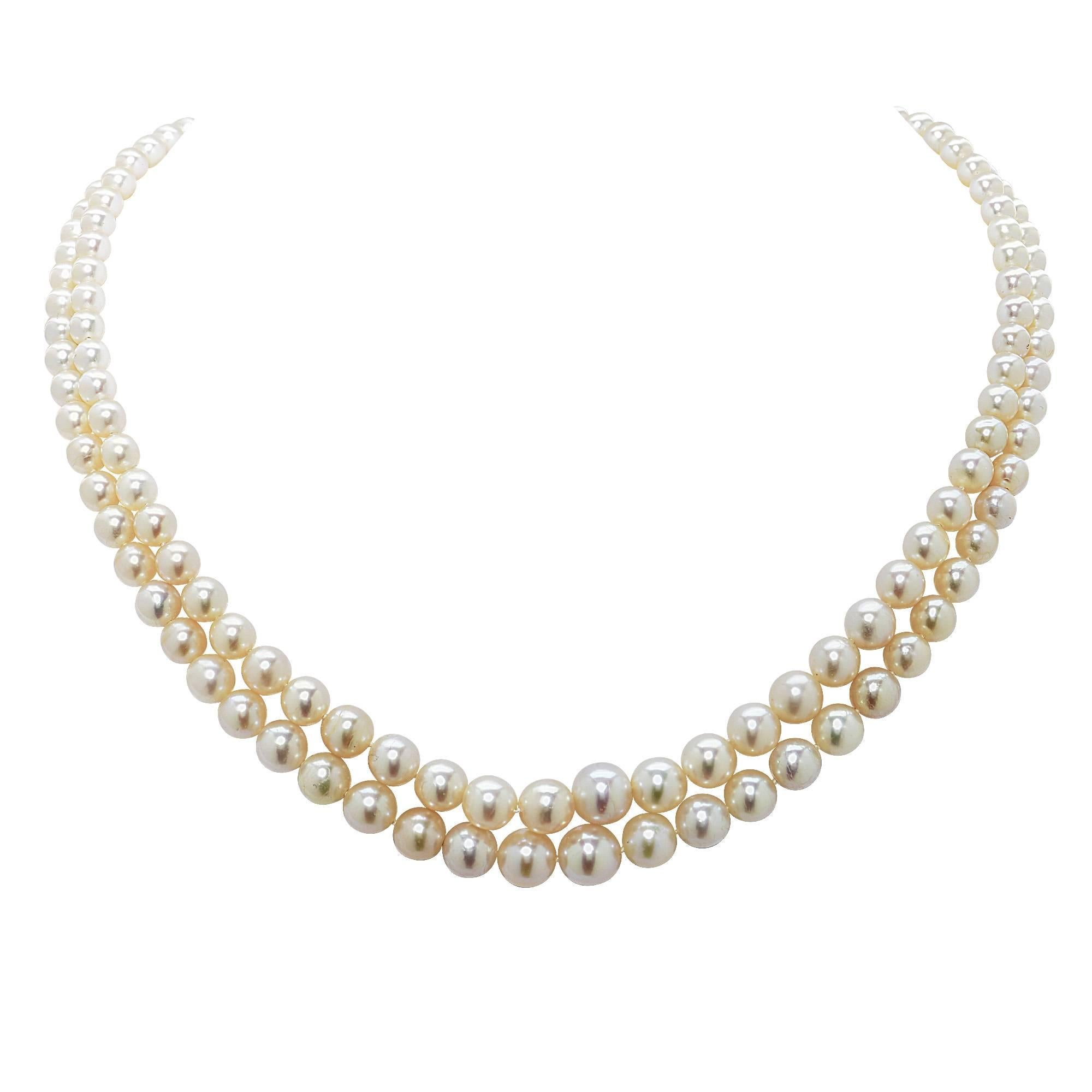 Beautiful Cartier natural pearl necklace with 145 pearls ranging from 3.68mm to 7.64mm. The pearl strands accented by a natural jade clasp signed CARTIER. 

This pearl and jade necklace is accompanied by a retail appraisal performed by a GIA
