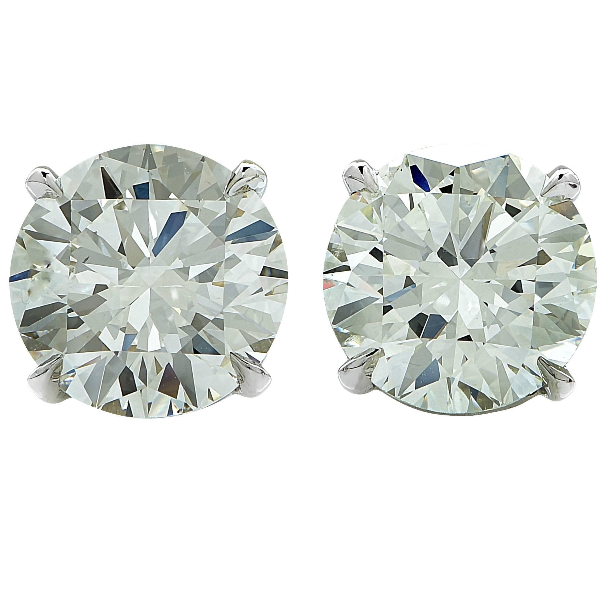 Vivid Diamonds 4.40 Carat GIA Diamond Solitaire Stud Earrings