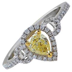 .48 Carat GIA Graded Fancy Yellow Diamond Halo Engagement Ring 2